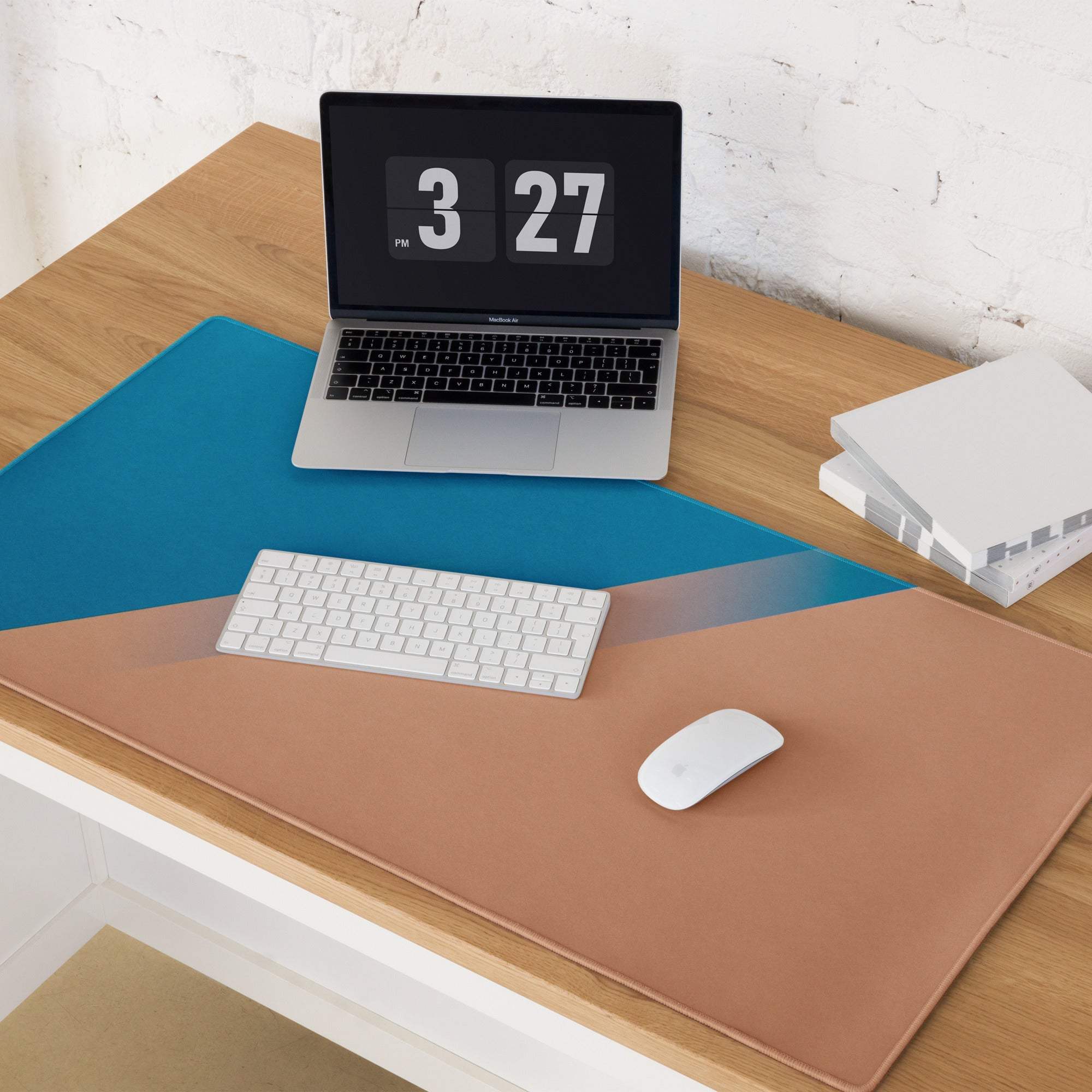 Tan leather desk mat with geometric blue tan design and non-slip backing