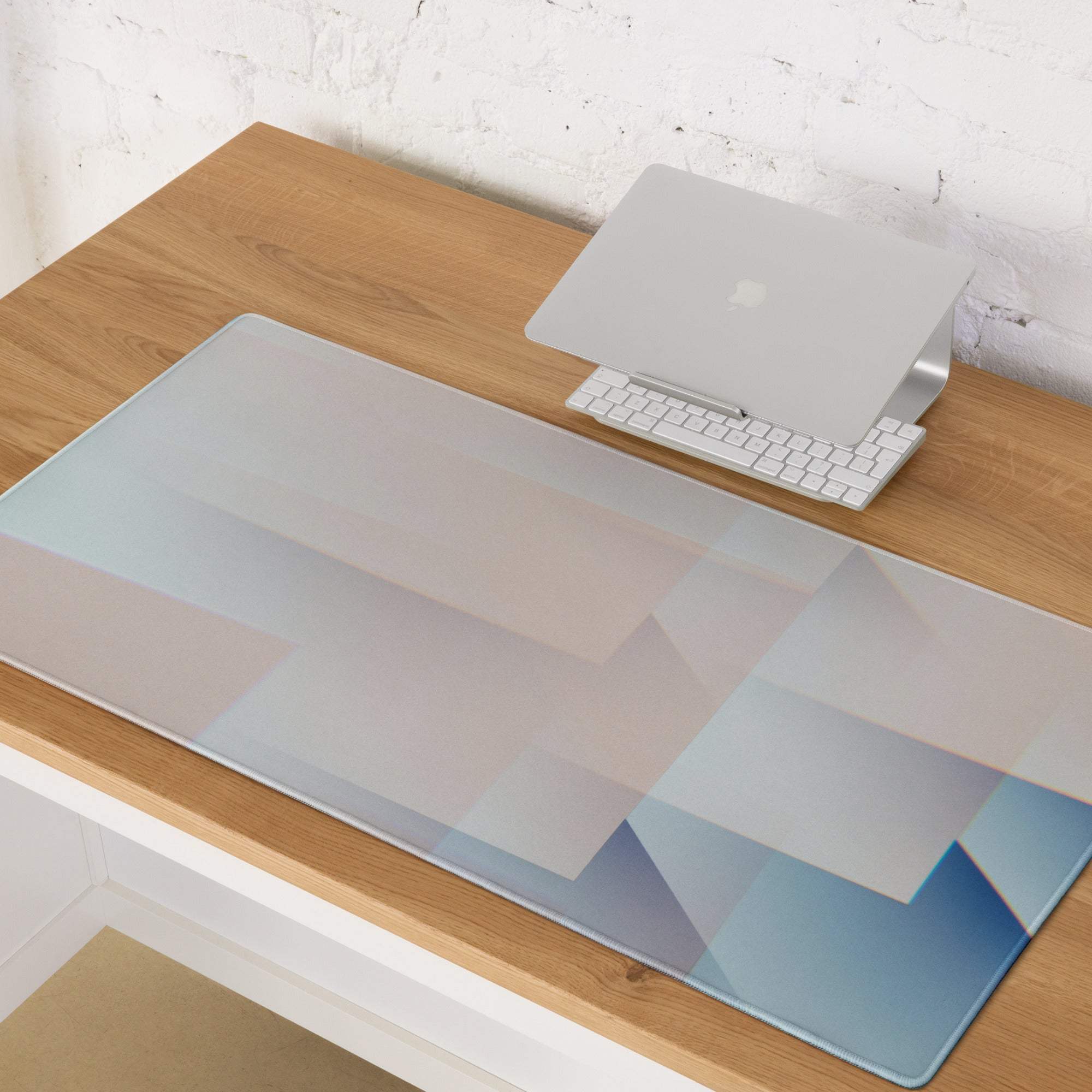 Transparent blue geometric design on large pastel gaming mouse pad