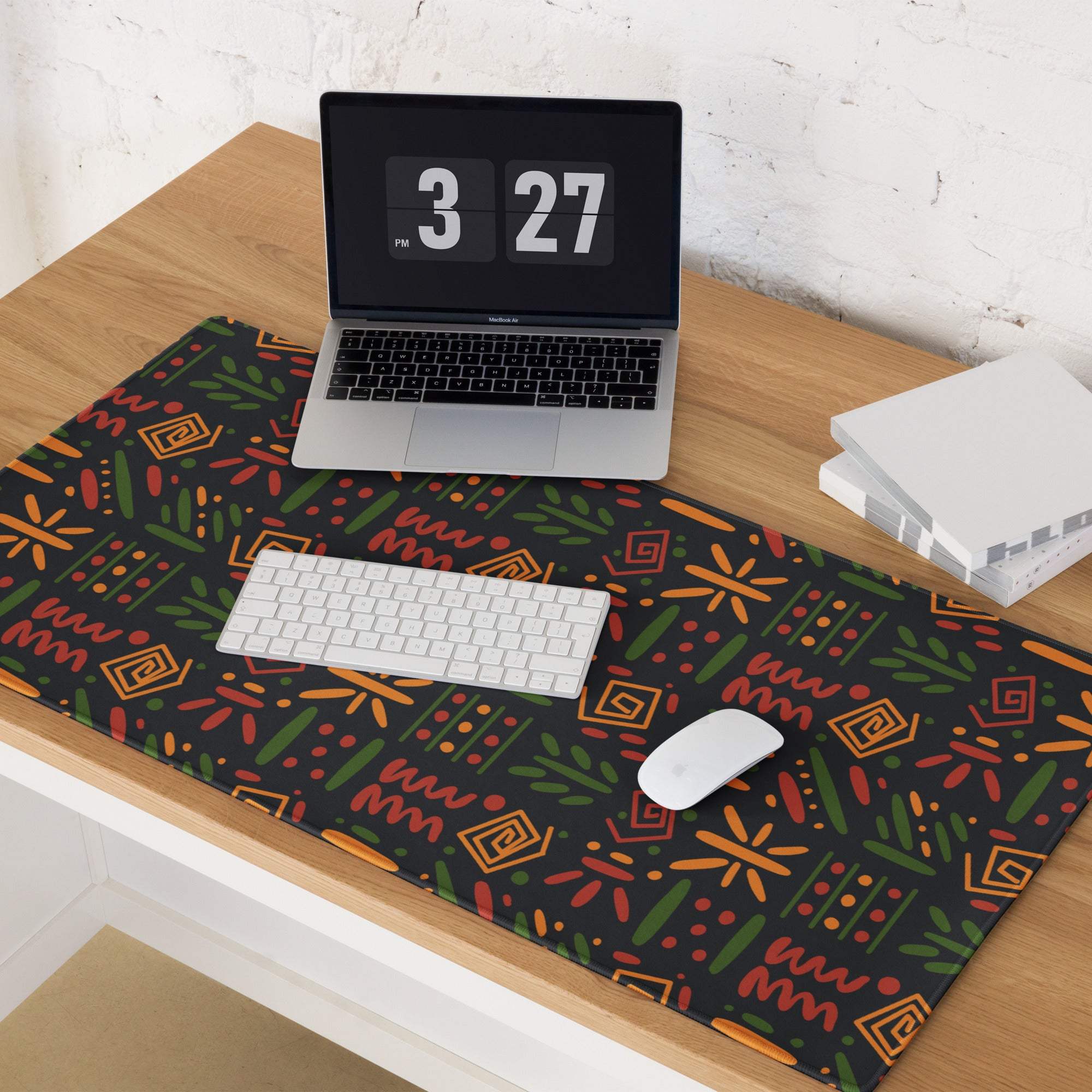 Vibrant dark green gaming mouse pad with orange green patterns, non-slip backing, edge stitching