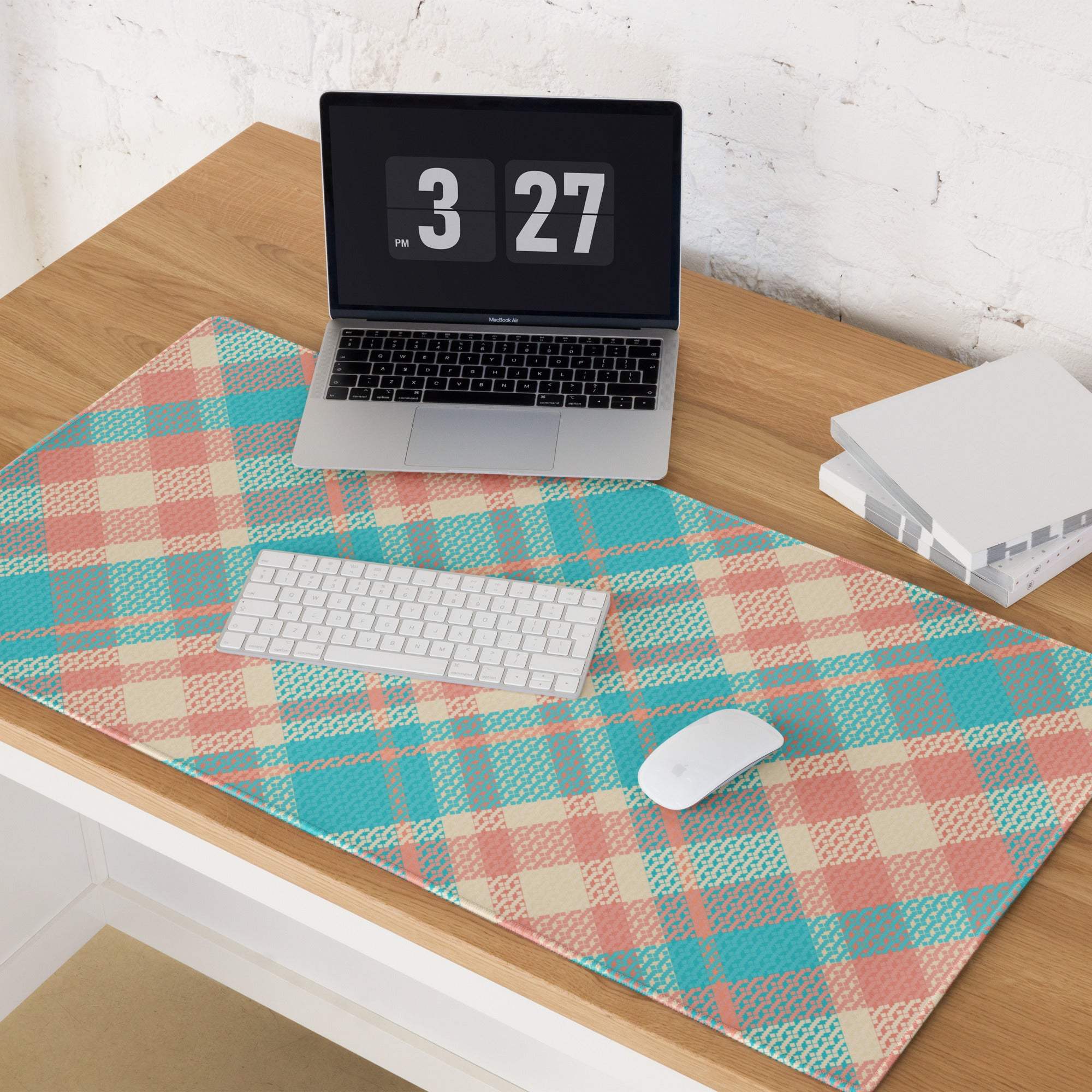 Vibrant teal peach plaid gaming mouse pad with non-slip base and stitched edges