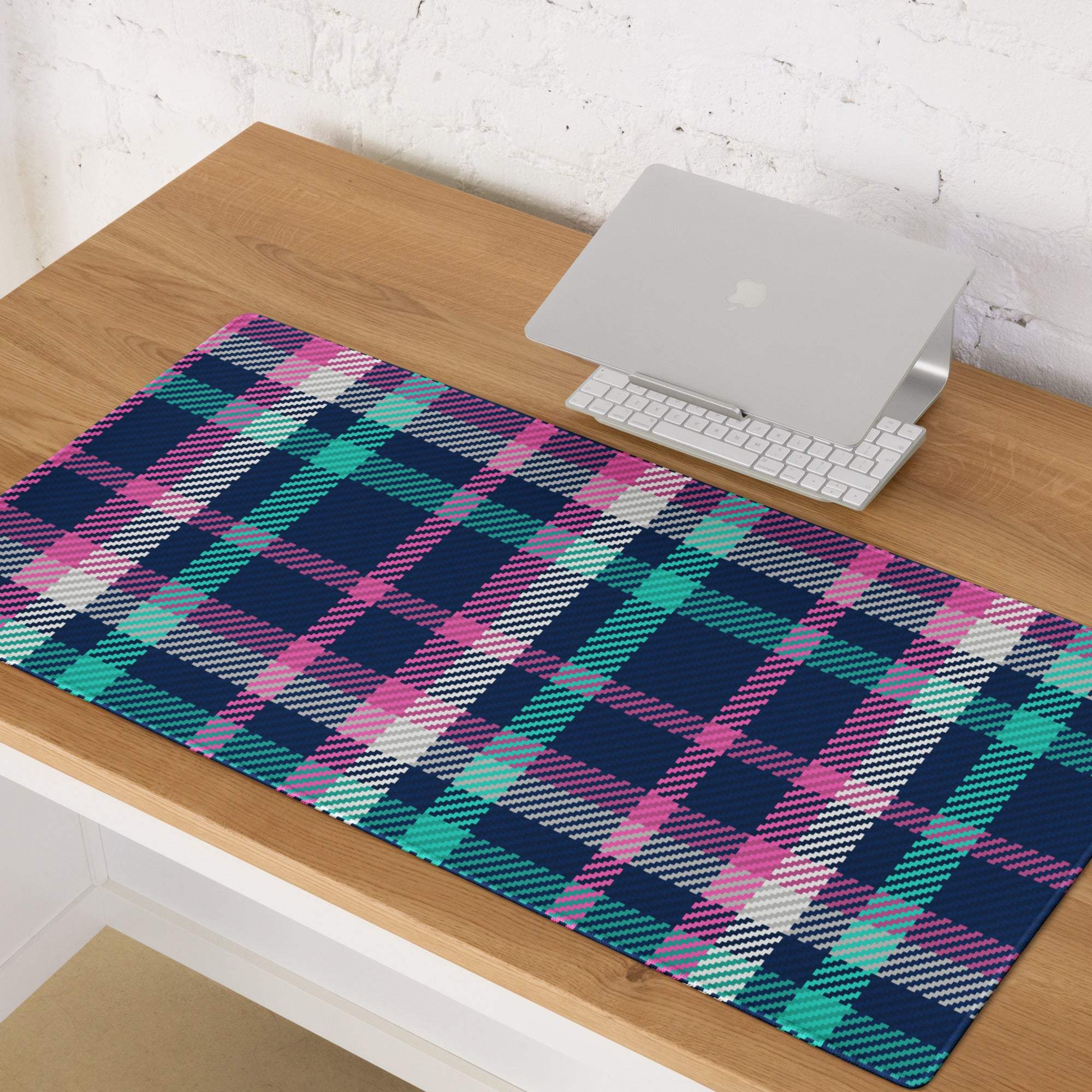 Vibrant pink navy teal plaid gaming mouse pad with non-slip base and stitching
