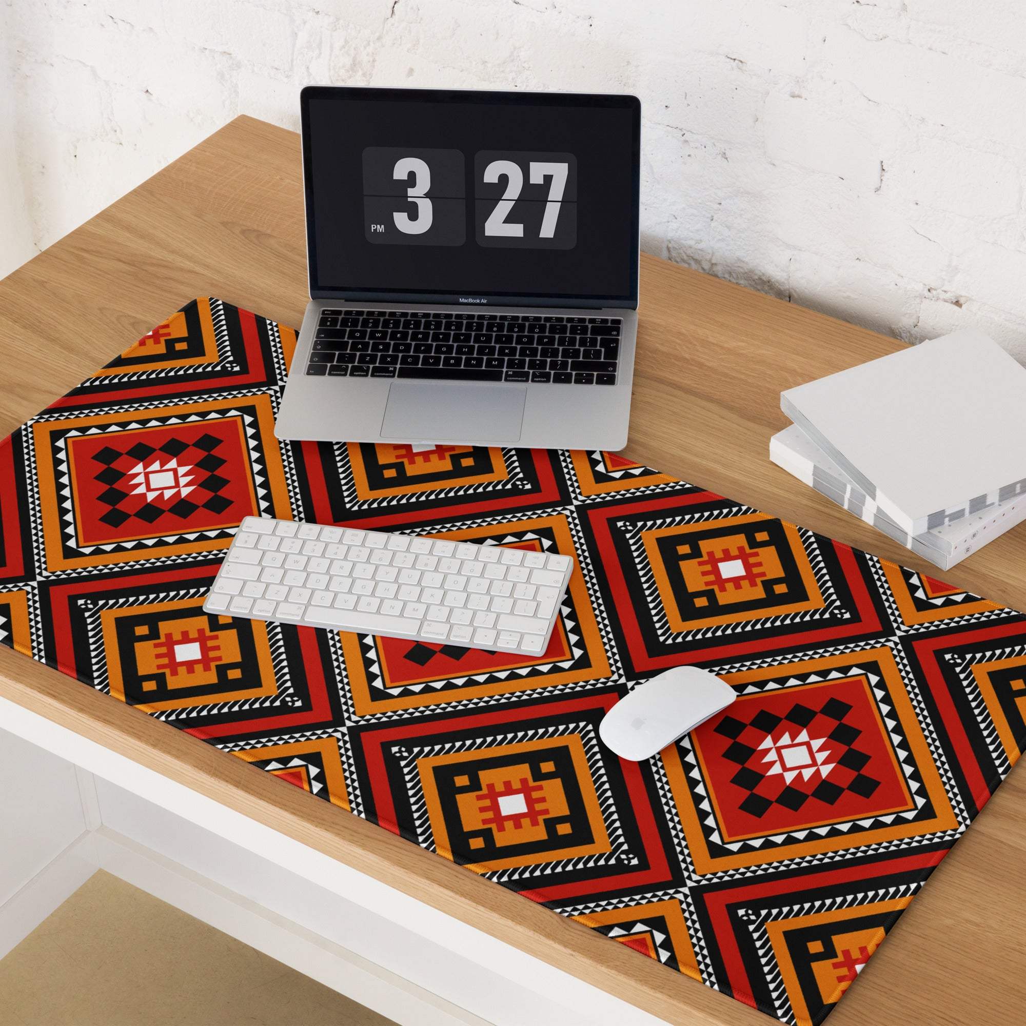 Vibrant tribal geometric diamond motif gaming mouse pad in bold red orange black white