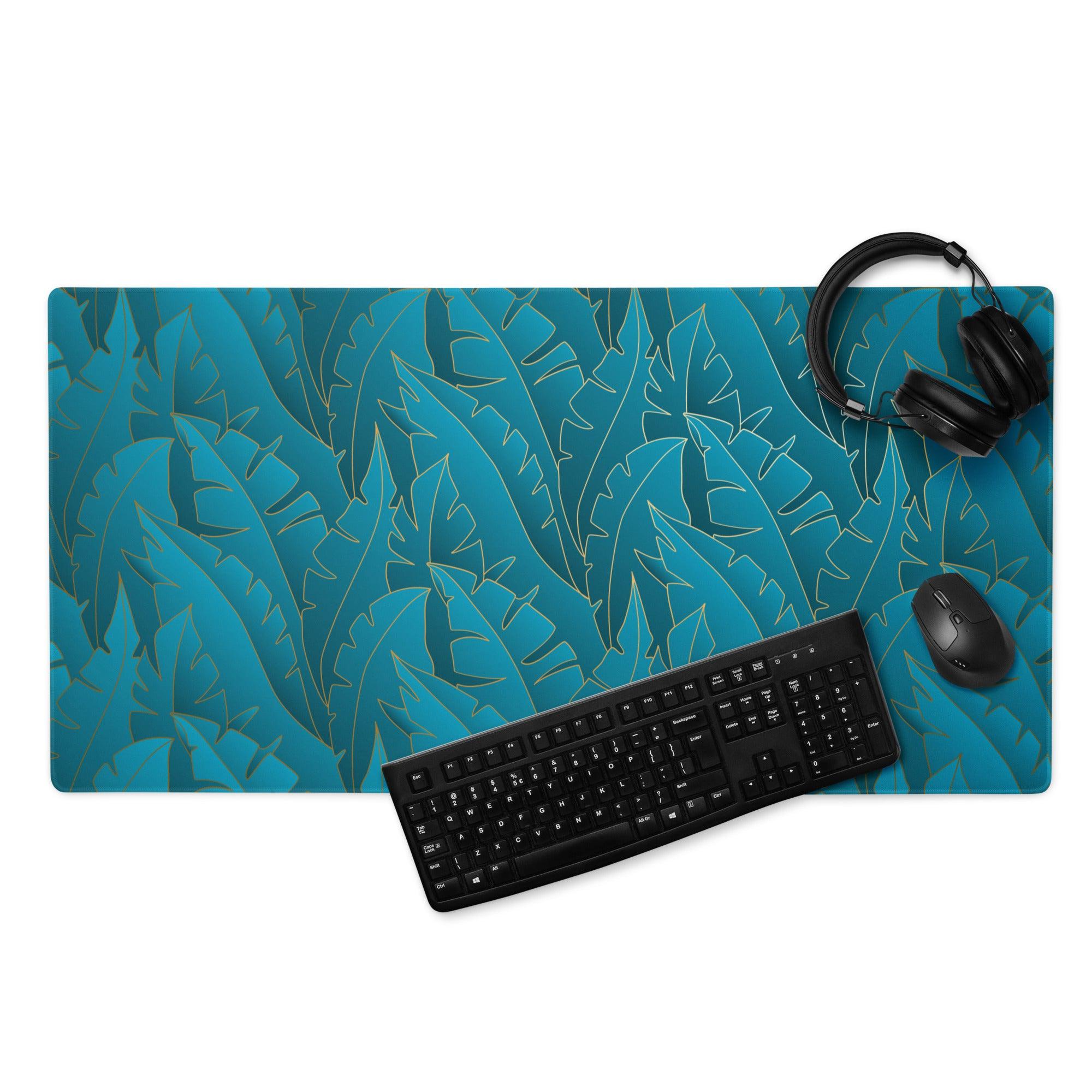 Teal tropical leaf mousepad with gold outlines and non-slip base