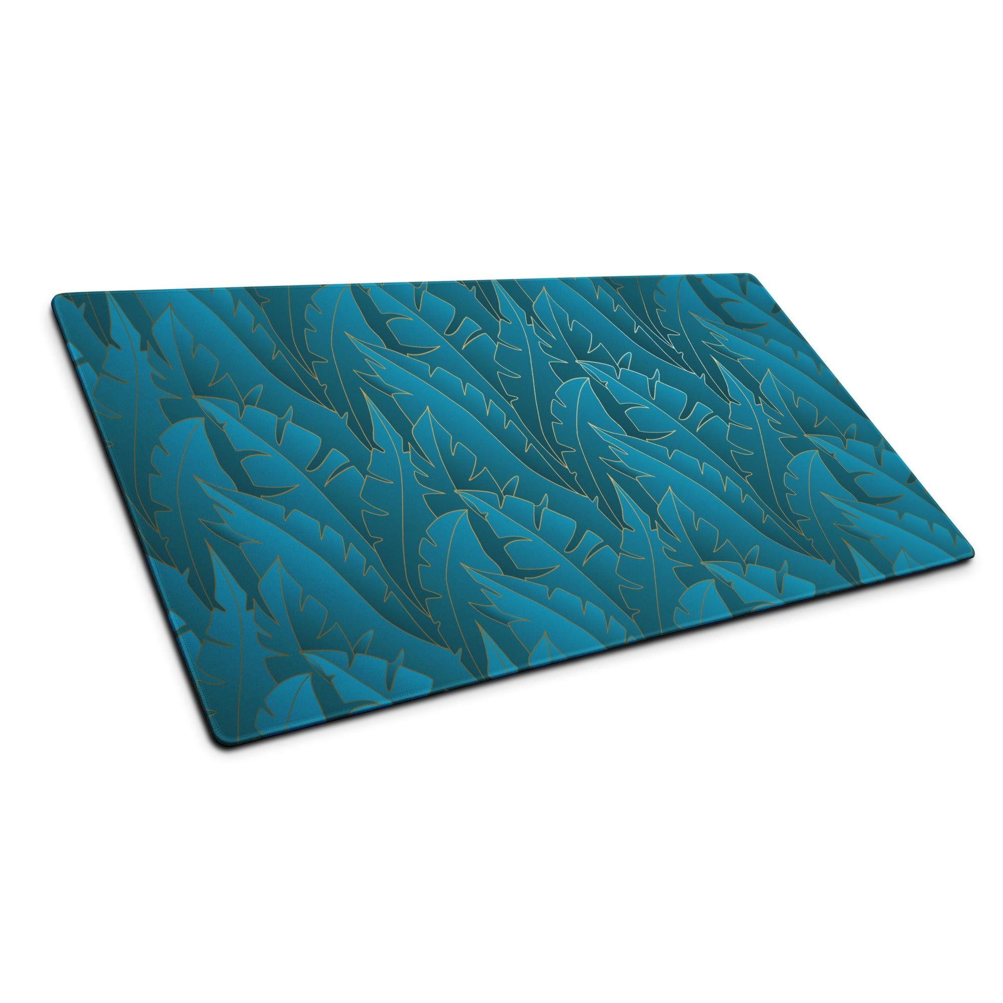Teal agave leaf cutting board with gold outlines on tropical gaming mouse pad