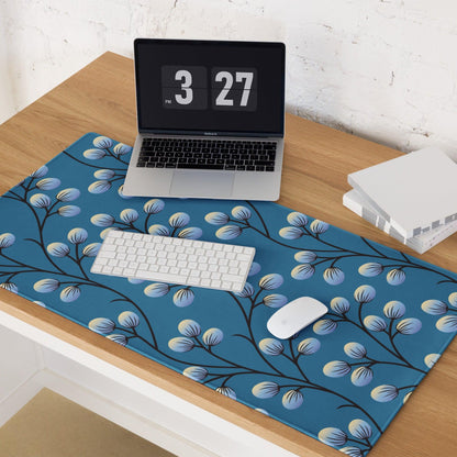 Blue gaming mouse pad with black branch pattern and light blue buds