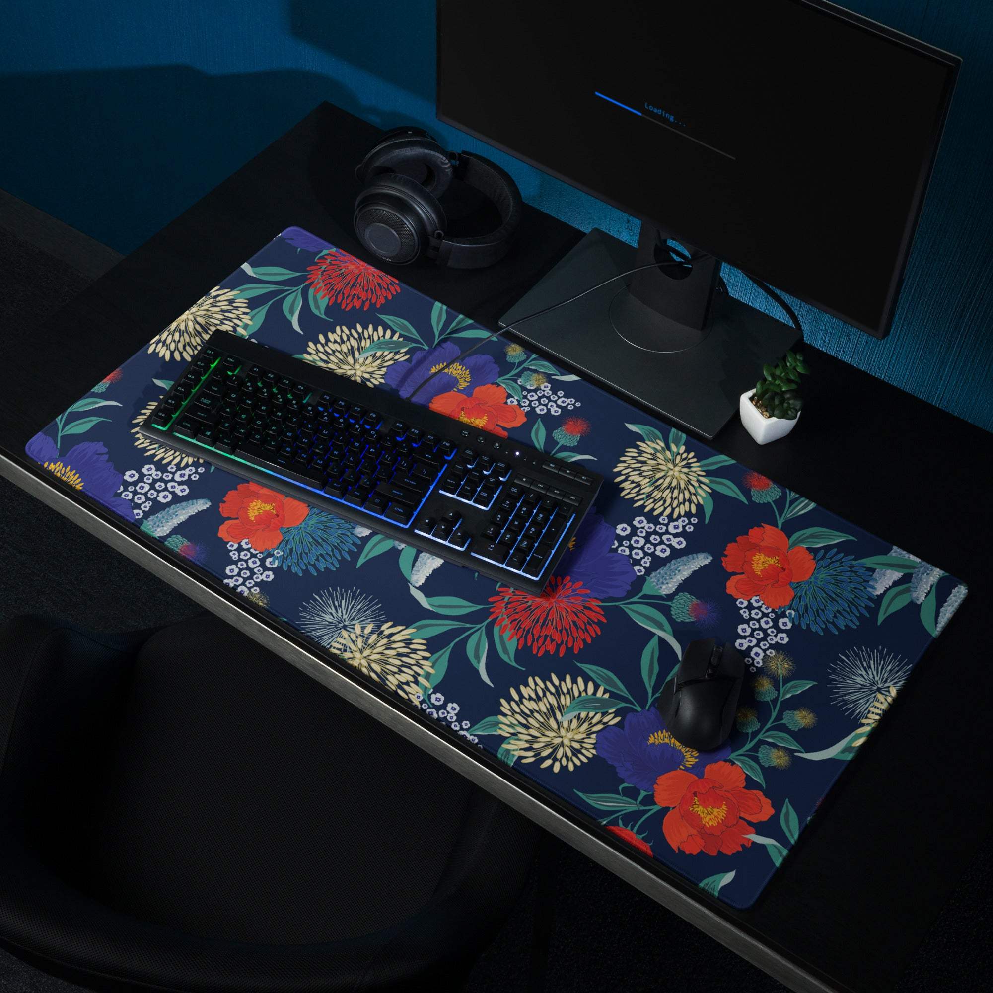 Floral navy blue gaming mouse pad with red purple yellow blossoms, stitched edges, non-slip base