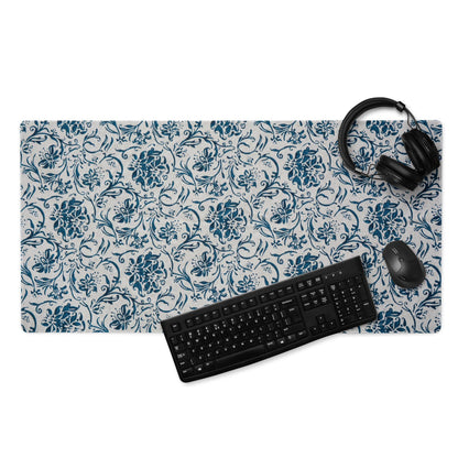Elegant blue floral large gaming mouse pad with non-slip base on gray background