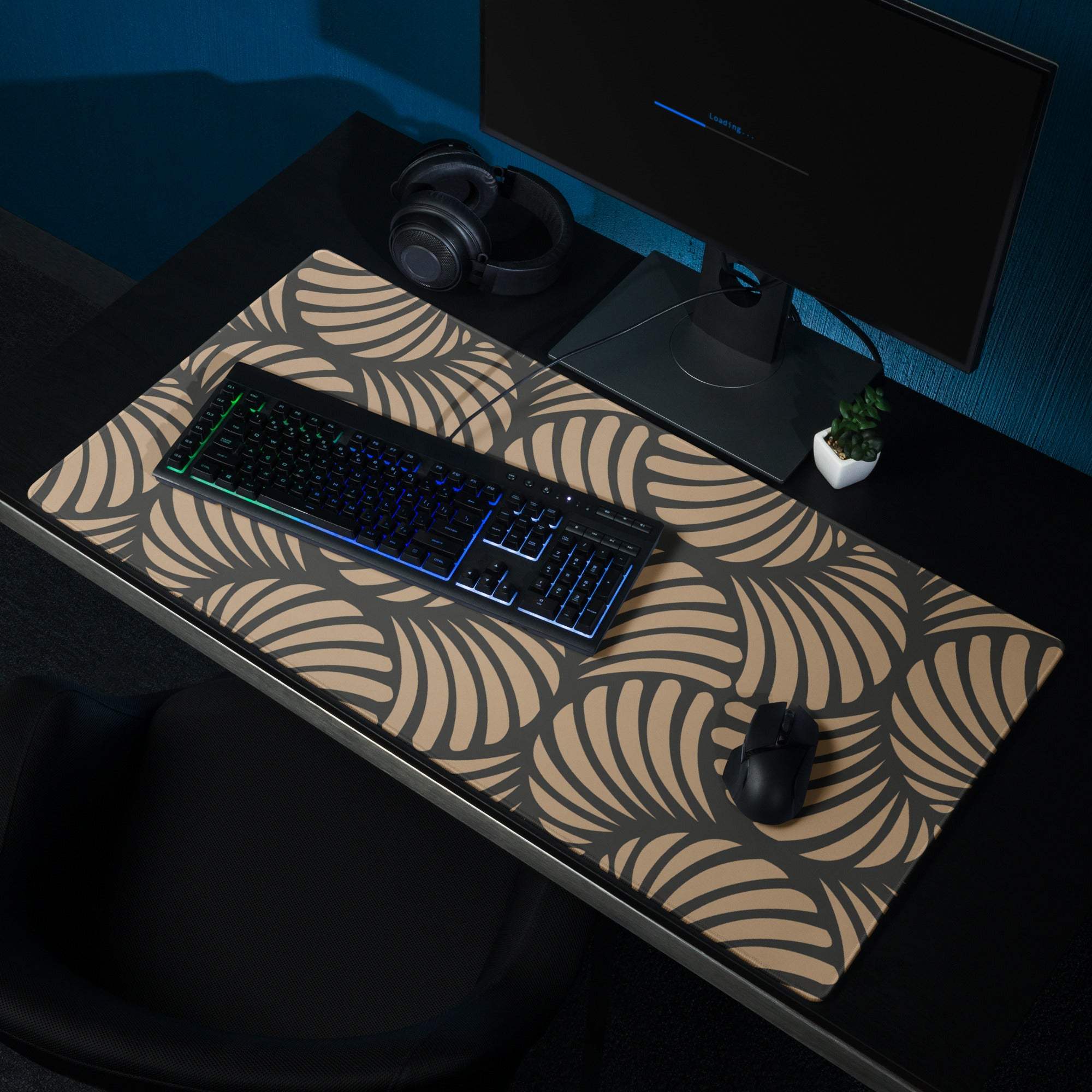 Large tan geometric gaming mouse pad with non-slip backing and stitched edges
