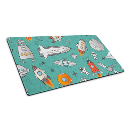 Teal space-themed cutting board with rockets, astronauts, non-slip base