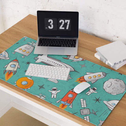 Teal space-themed gaming mouse pad with rockets, astronauts, satellites, non-slip base
