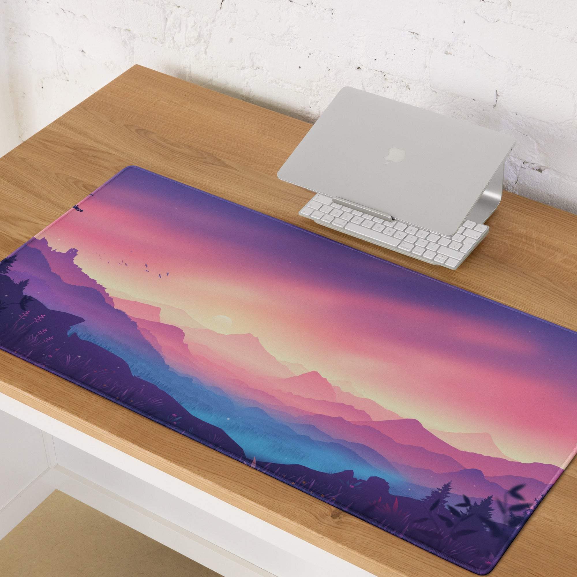 Dreamy mountain sunset gaming mouse pad with pink-purple gradient and non-slip backing