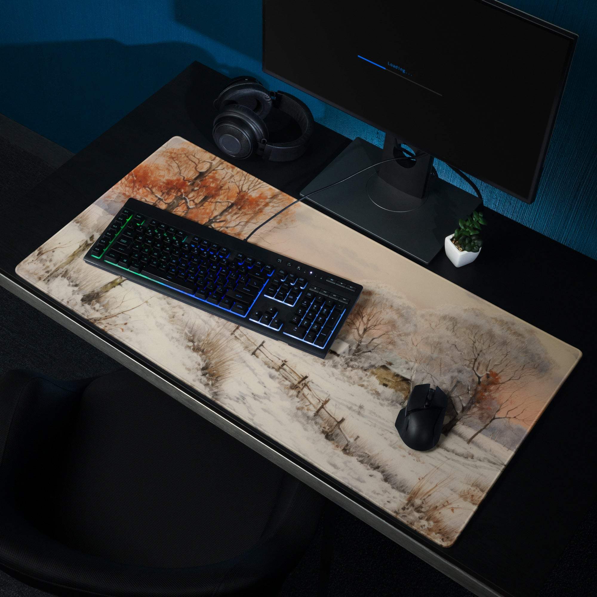 Large nature-inspired snowy winter landscape gaming mouse pad with autumn trees