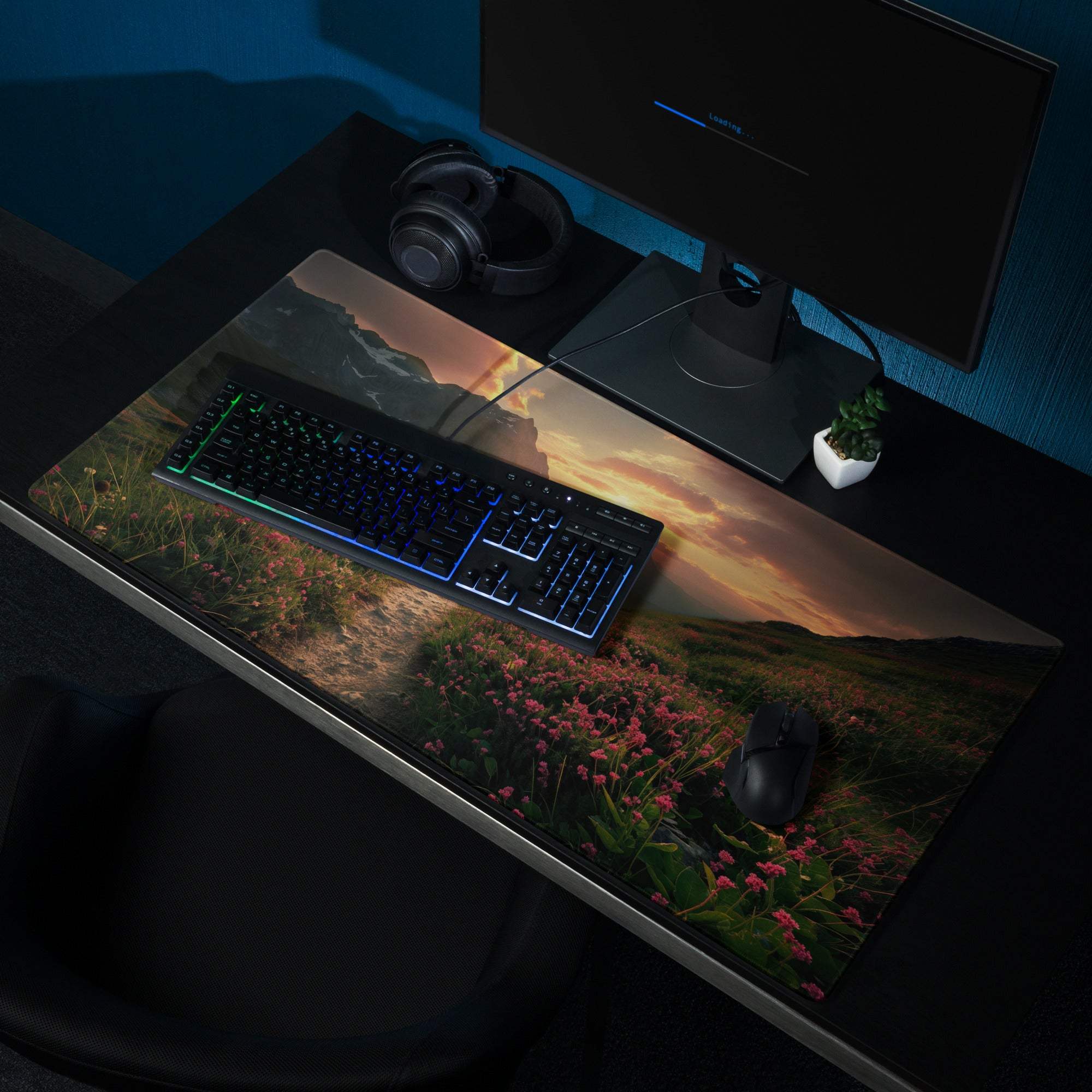 Epic sunset mountain landscape with flower field gaming mouse pad