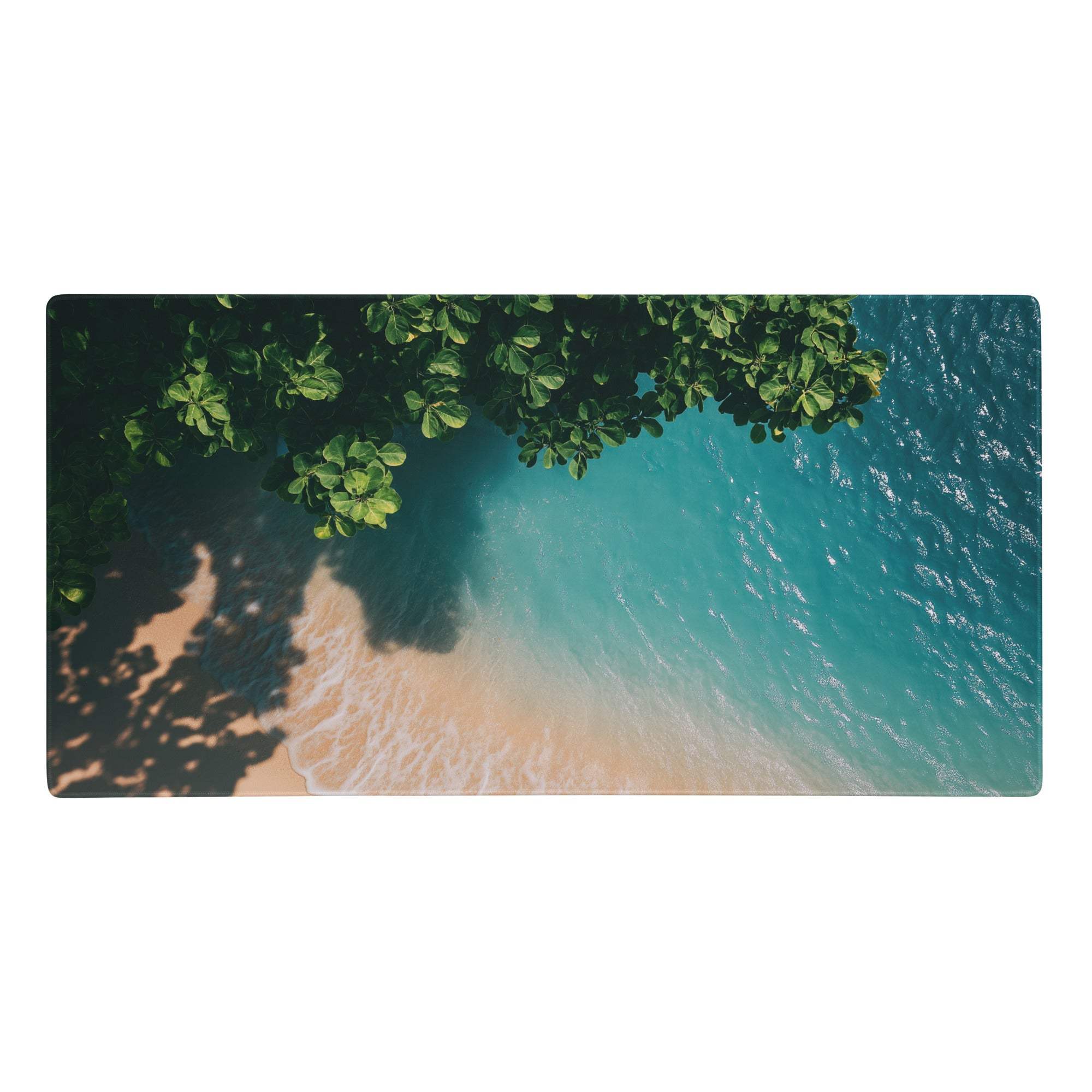 Ocean teal mouse pad featuring a vibrant turquoise ocean and sandy shore with lush green tree branches edge stitched