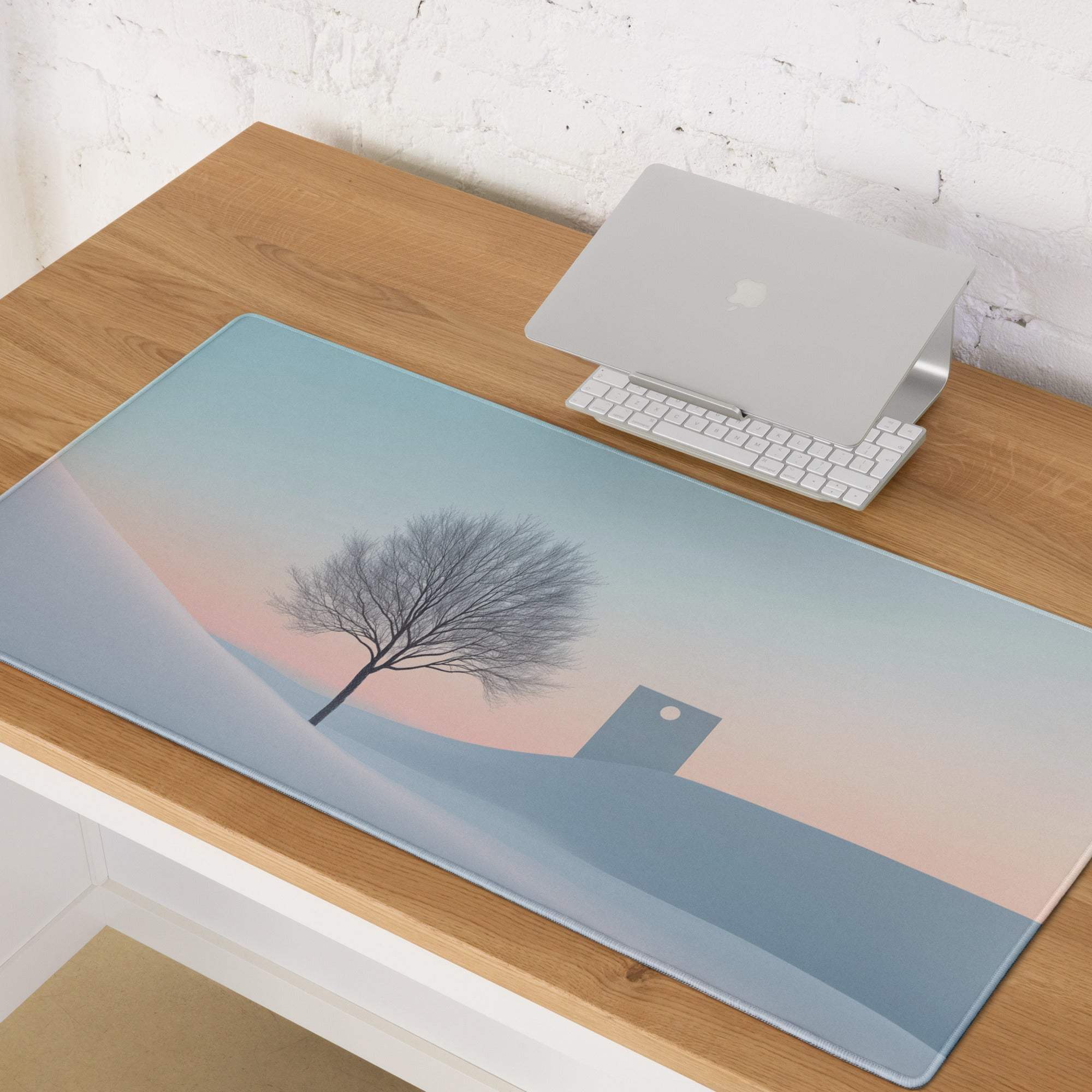 Calm winter landscape gaming mouse pad with minimalist tree, large stitched edges