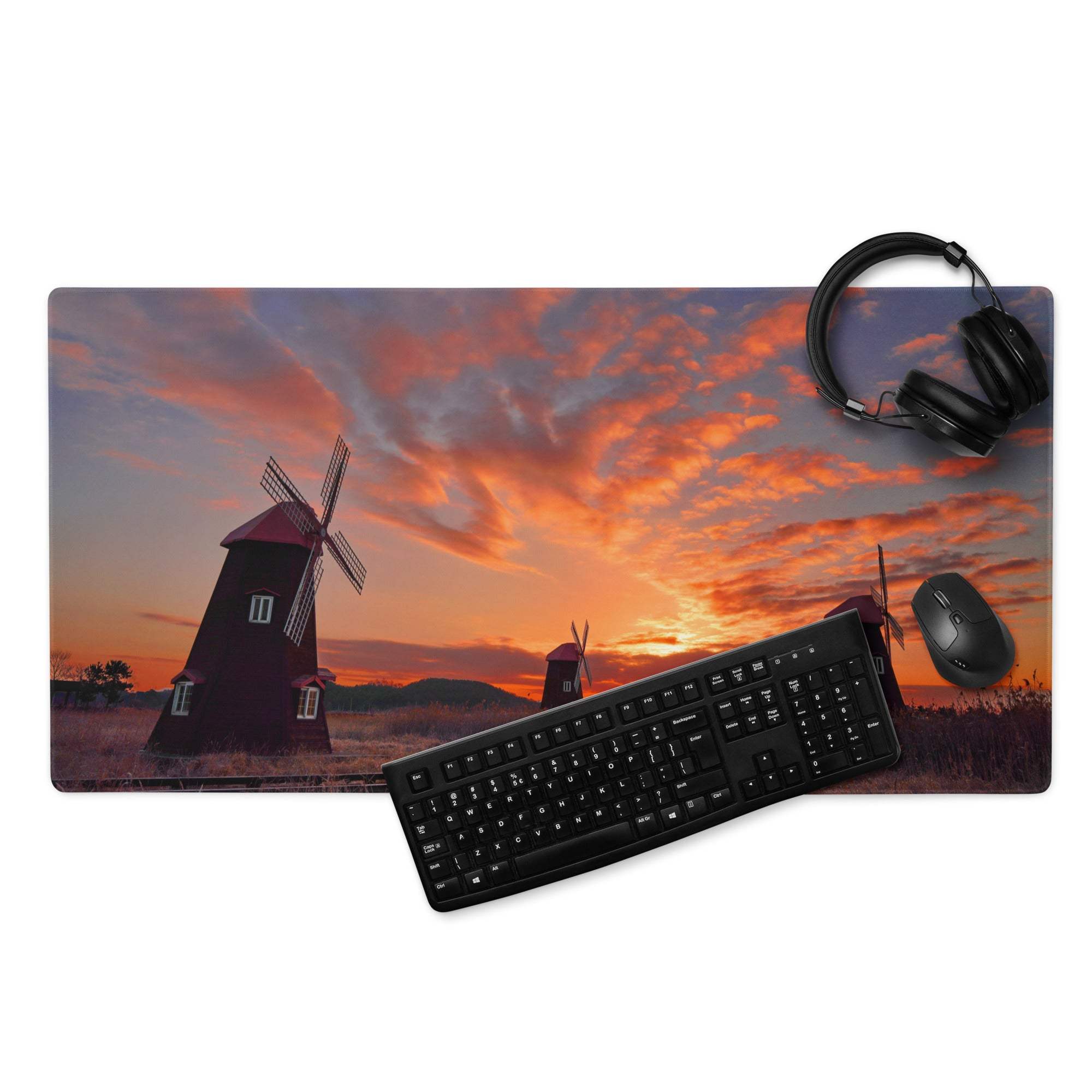 Vibrant sunset windmill gaming mouse pad with orange clouds