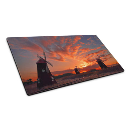 Rectangular glass cutting board with vibrant sunset windmills and orange sky
