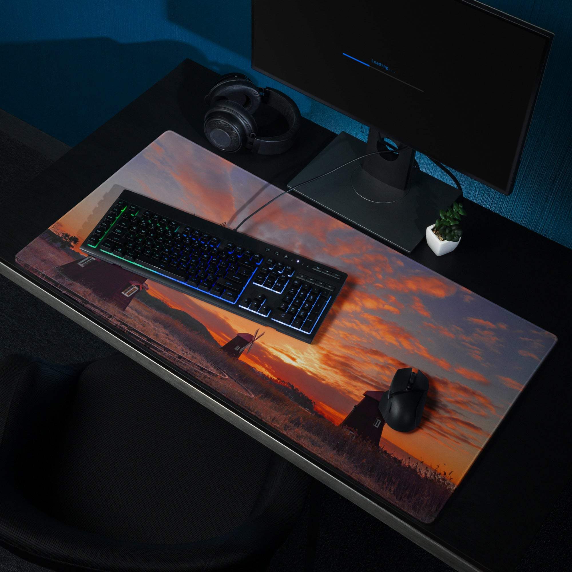 Vibrant sunset windmill gaming mouse pad with orange hues and dramatic sky
