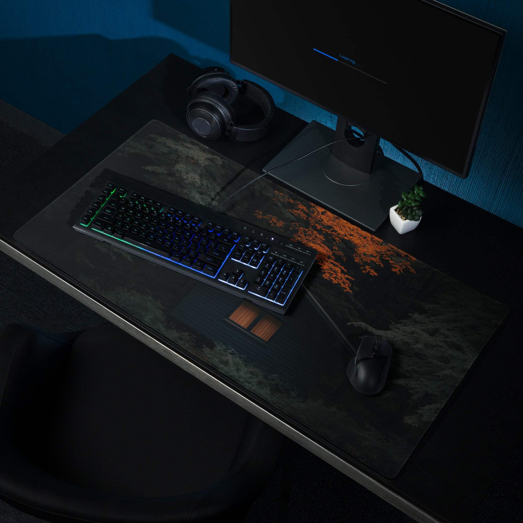 Black Mystic Forest Cabin gaming mousepad with orange gray design