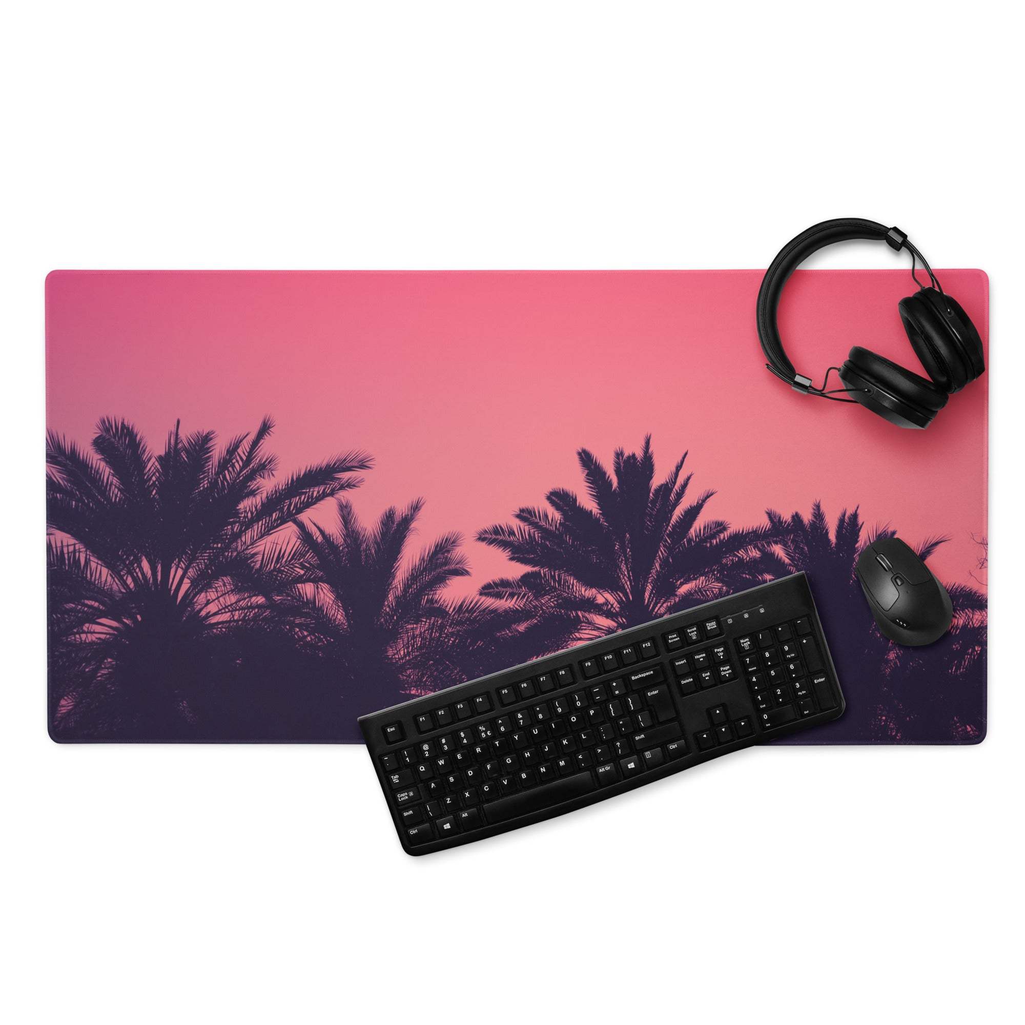 Large pink-to-purple palm sunset gaming mousepad with keyboard and mouse