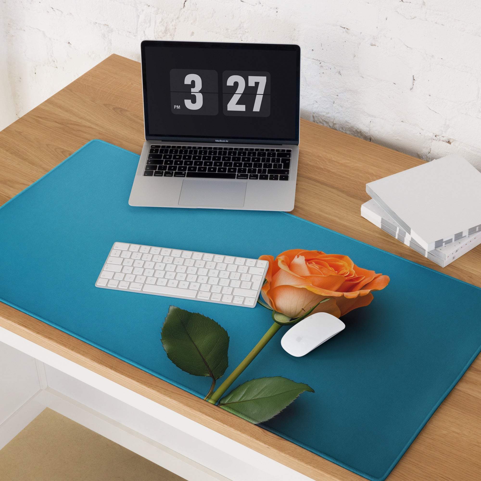 Elegant blue gaming mouse pad with orange rose and green leaves design