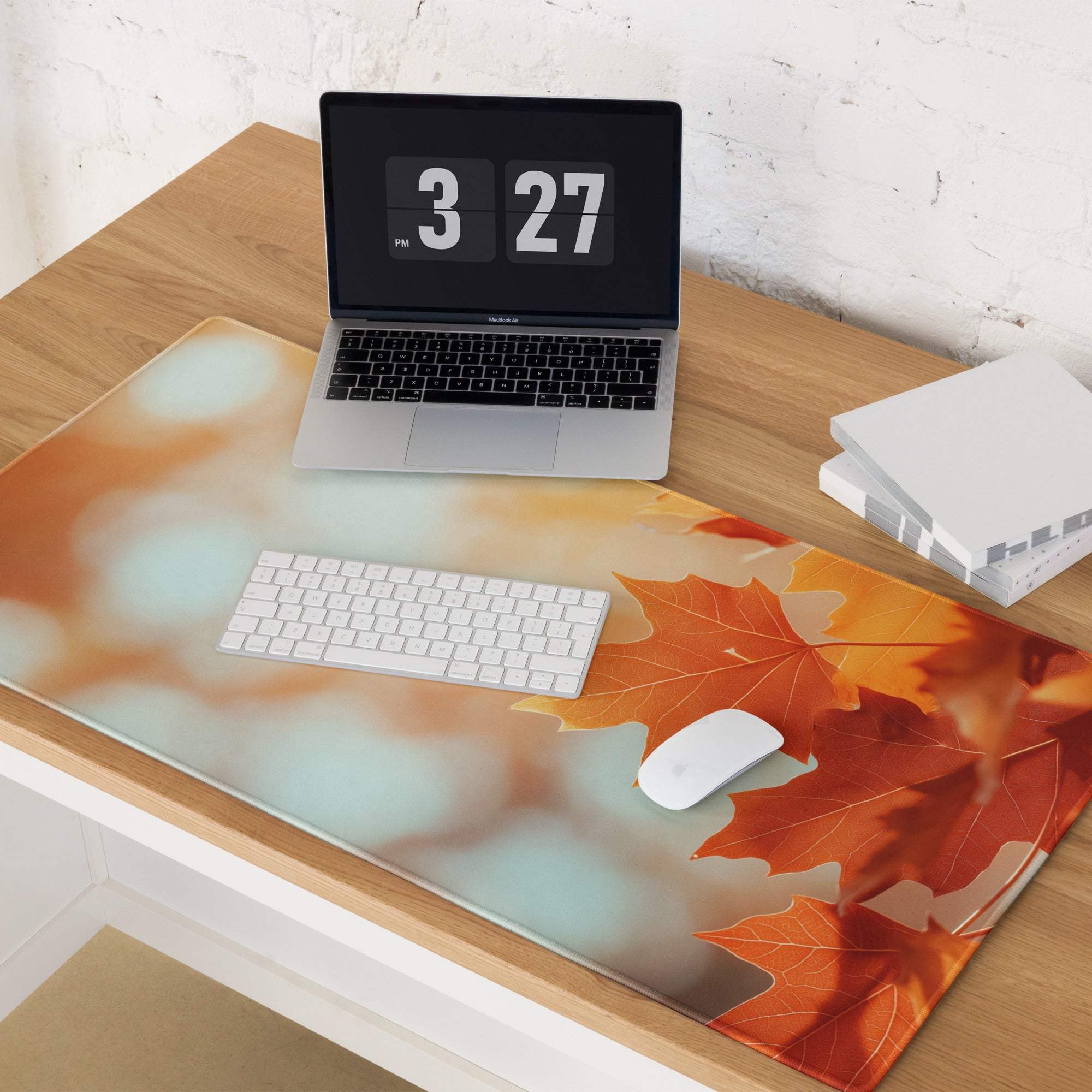 Autumn leaves gaming mouse pad with orange maple leaves on teal bokeh