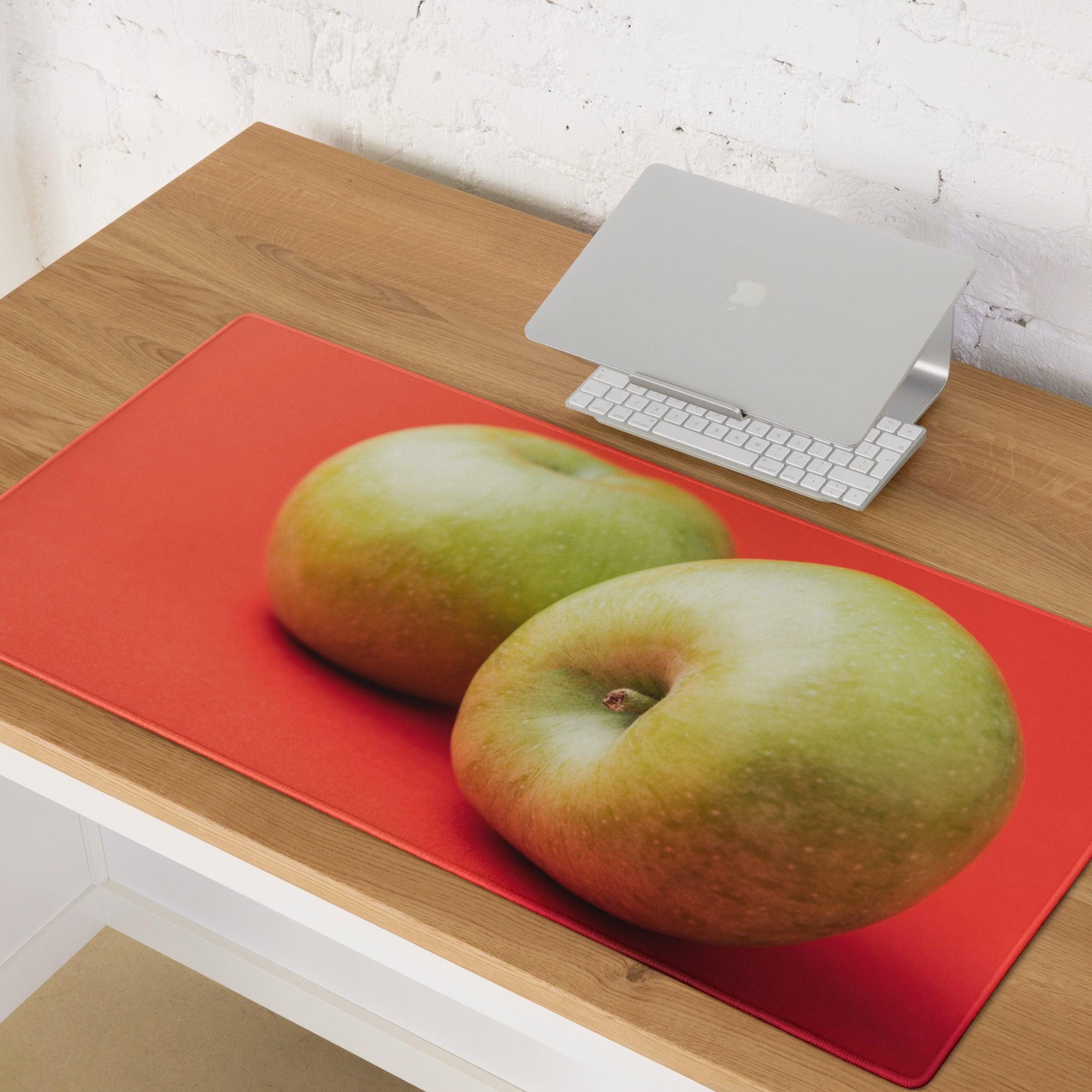 Red rectangular mousepad with realistic green apple duo print and non-slip base