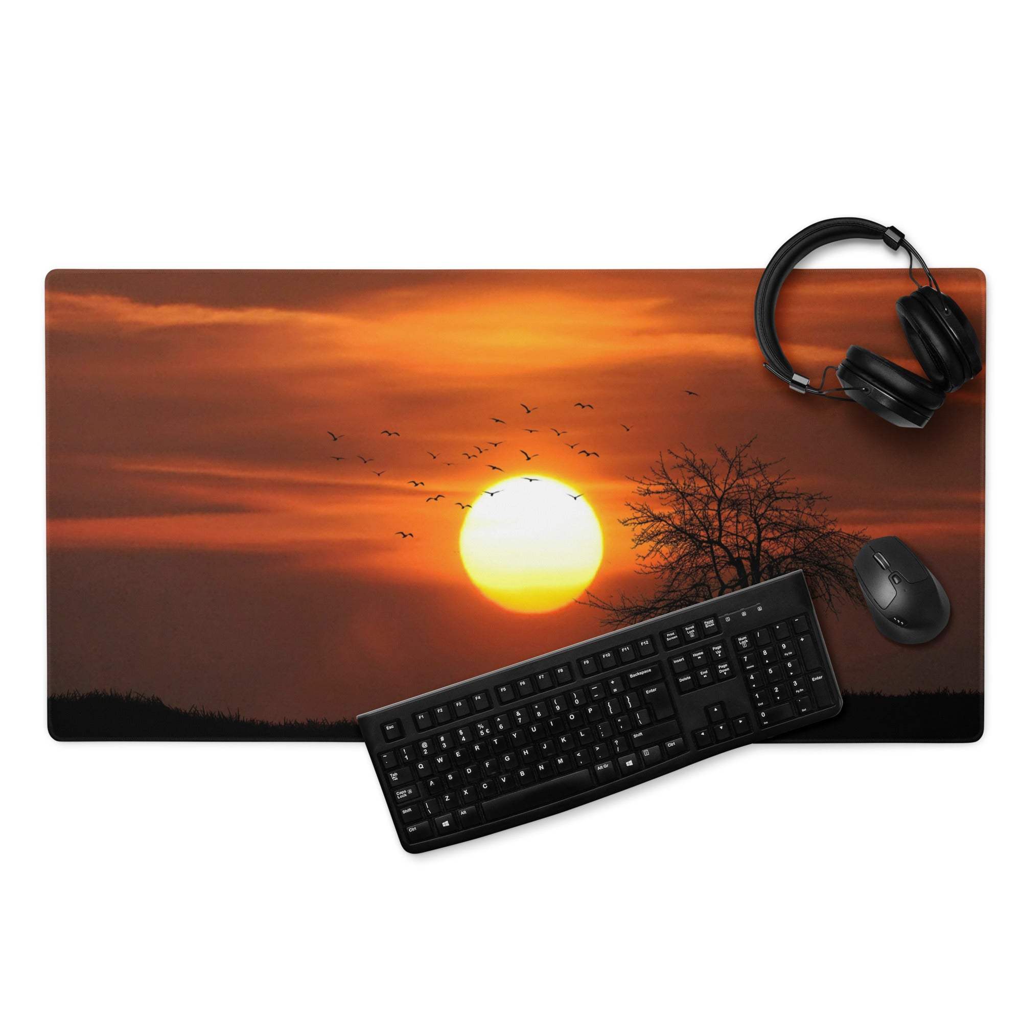 Warm sunset gaming mouse pad with orange sun, birds, trees, non-slip base