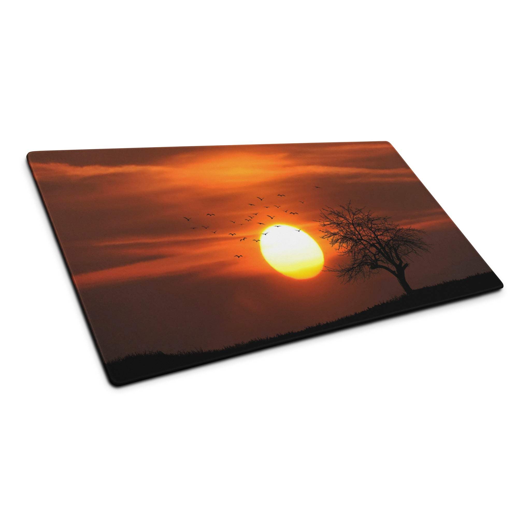 Warm sunset gaming mouse pad with orange sun, birds, tree silhouette
