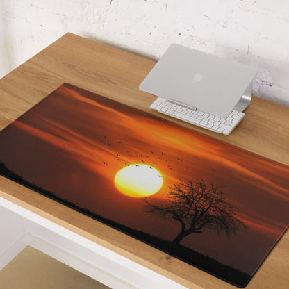Warm sunset gaming mouse pad with vivid orange sun, birds, tree silhouette