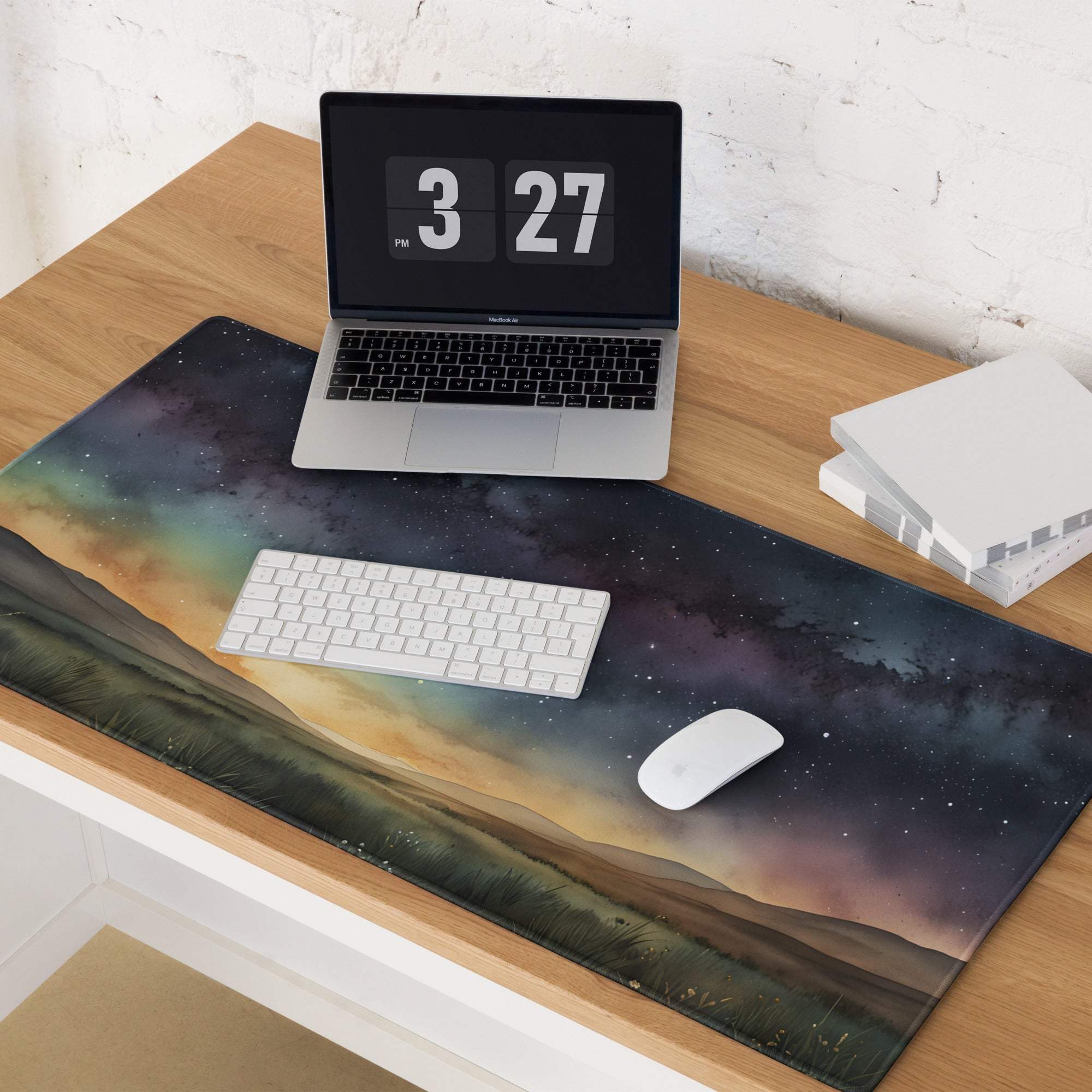 Vibrant cosmic gaming mouse pad with starry aurora sunset nebulae and hills