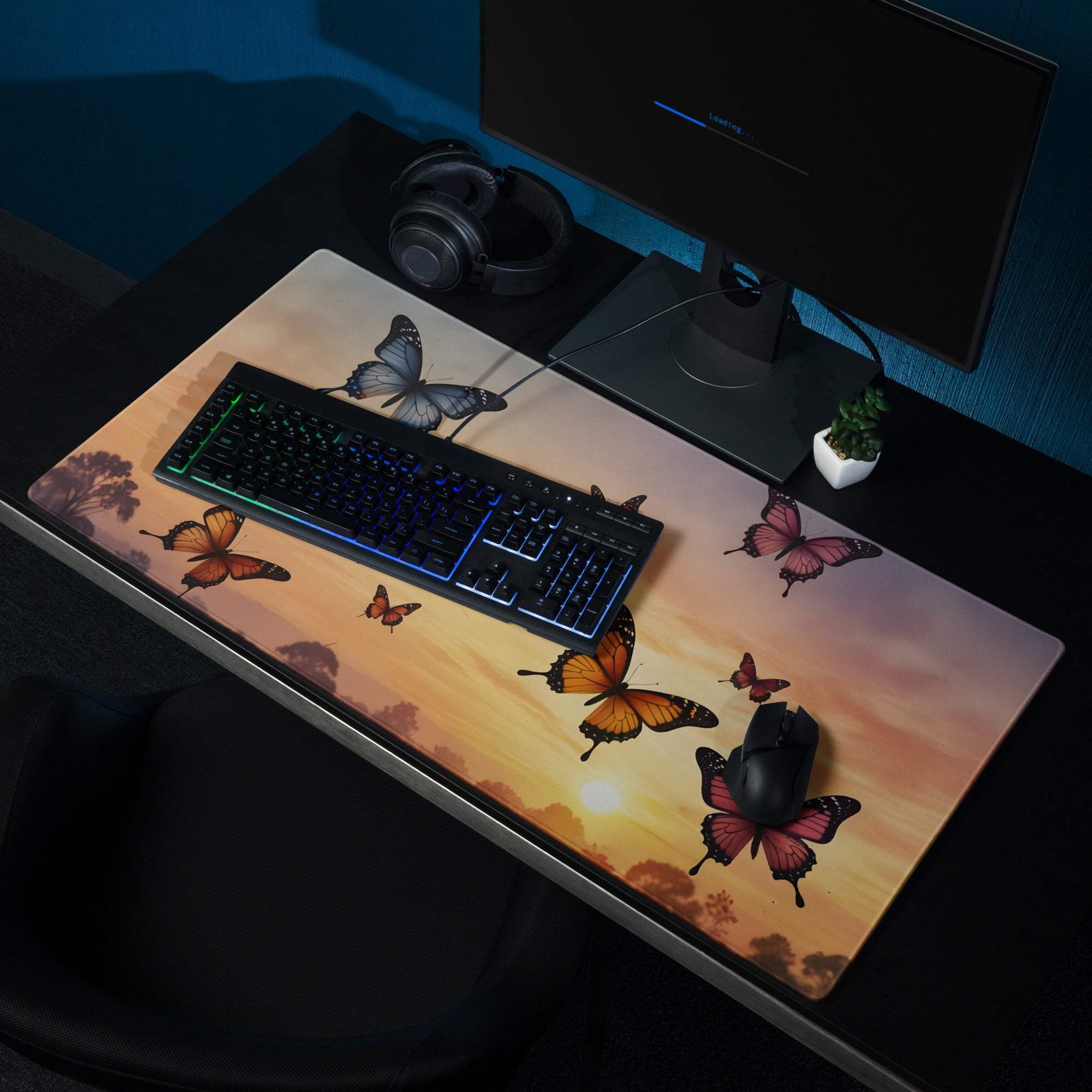 Sunset butterflies gaming mouse pad with vibrant orange pink gray hues