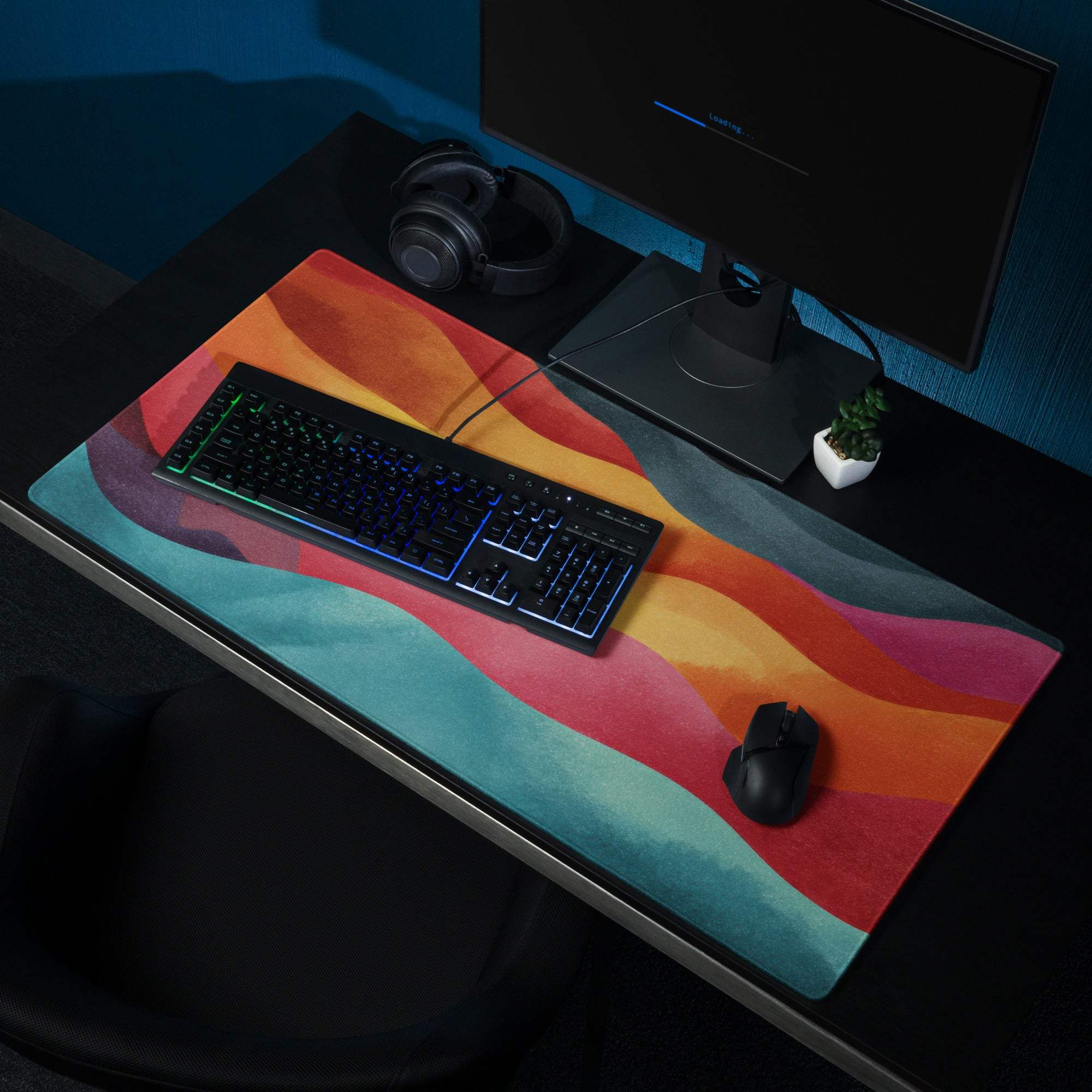 Vibrant rainbow wave gaming mousepad with non-slip base and stitched edges