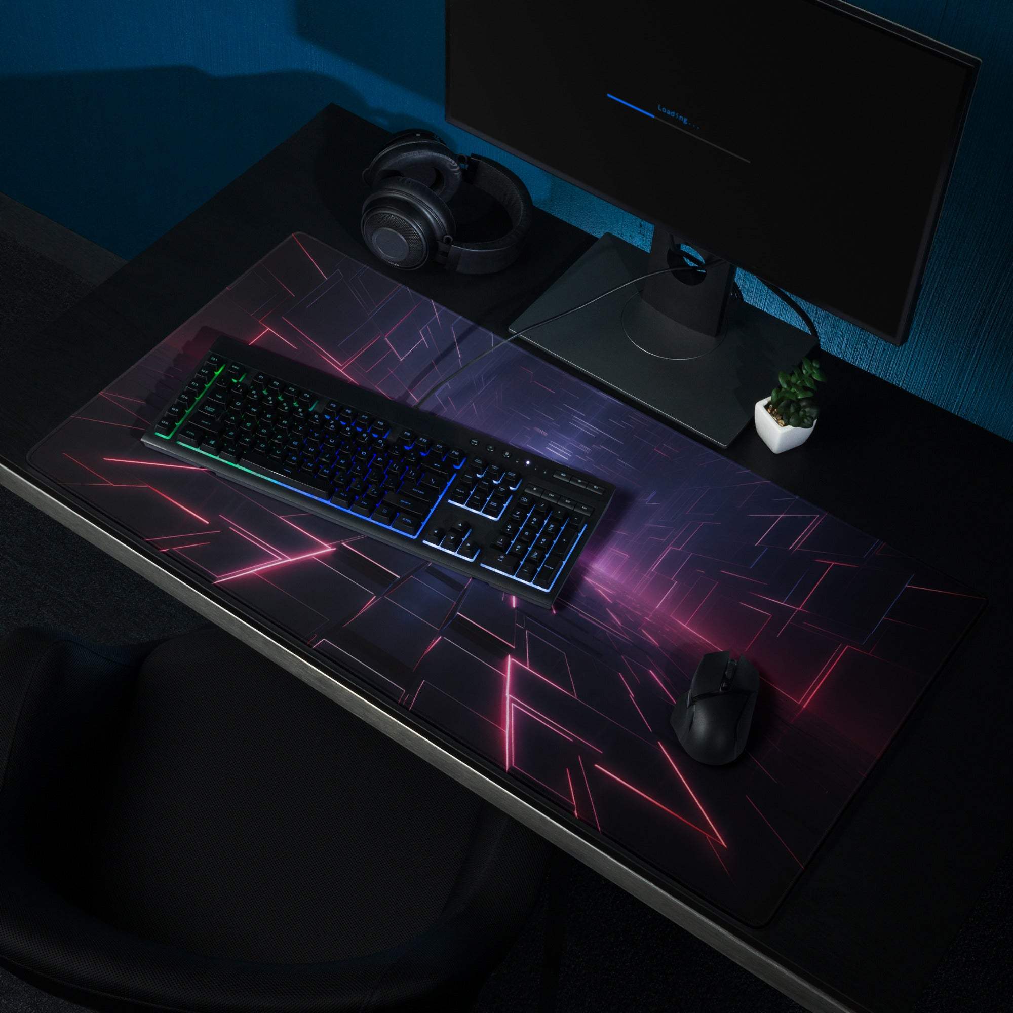 Sleek black gaming mousepad with pink blue neon geometric patterns, non-slip base, stitched edges