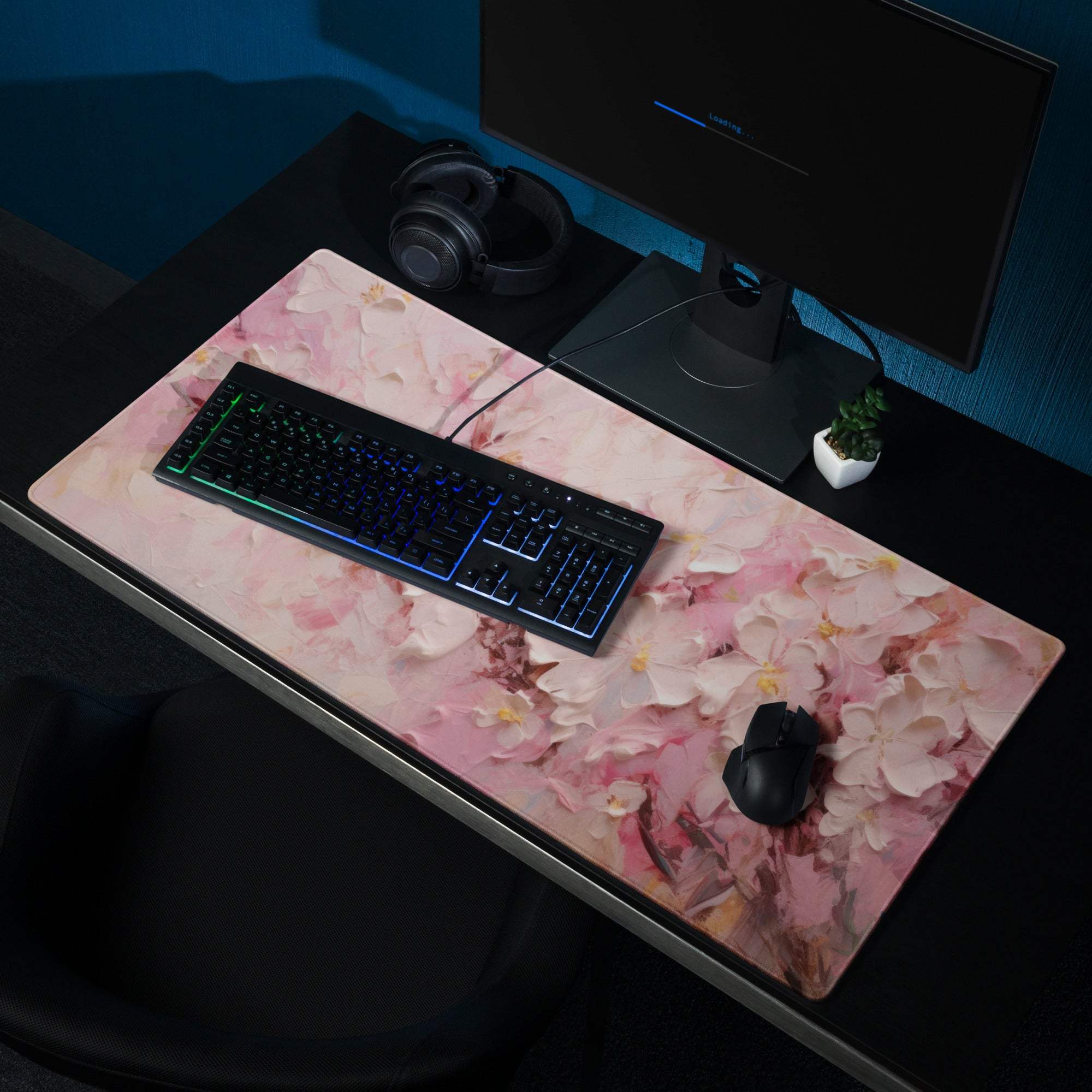 Pink floral gaming mouse pad with large surface, non-slip backing, edge stitching