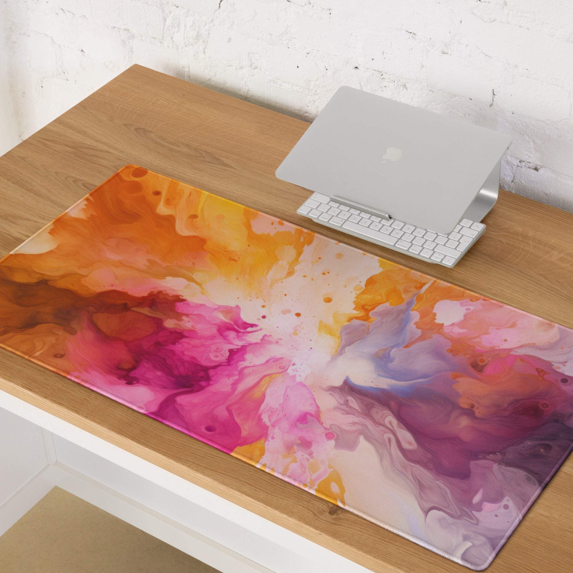 Vibrant multicolor abstract burst gaming mouse pad in pink, orange, purple with non-slip base