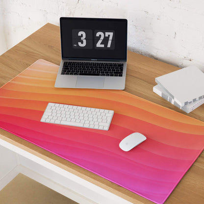 Vibrant sunset gradient orange-to-pink large gaming mouse pad with non-slip bottom