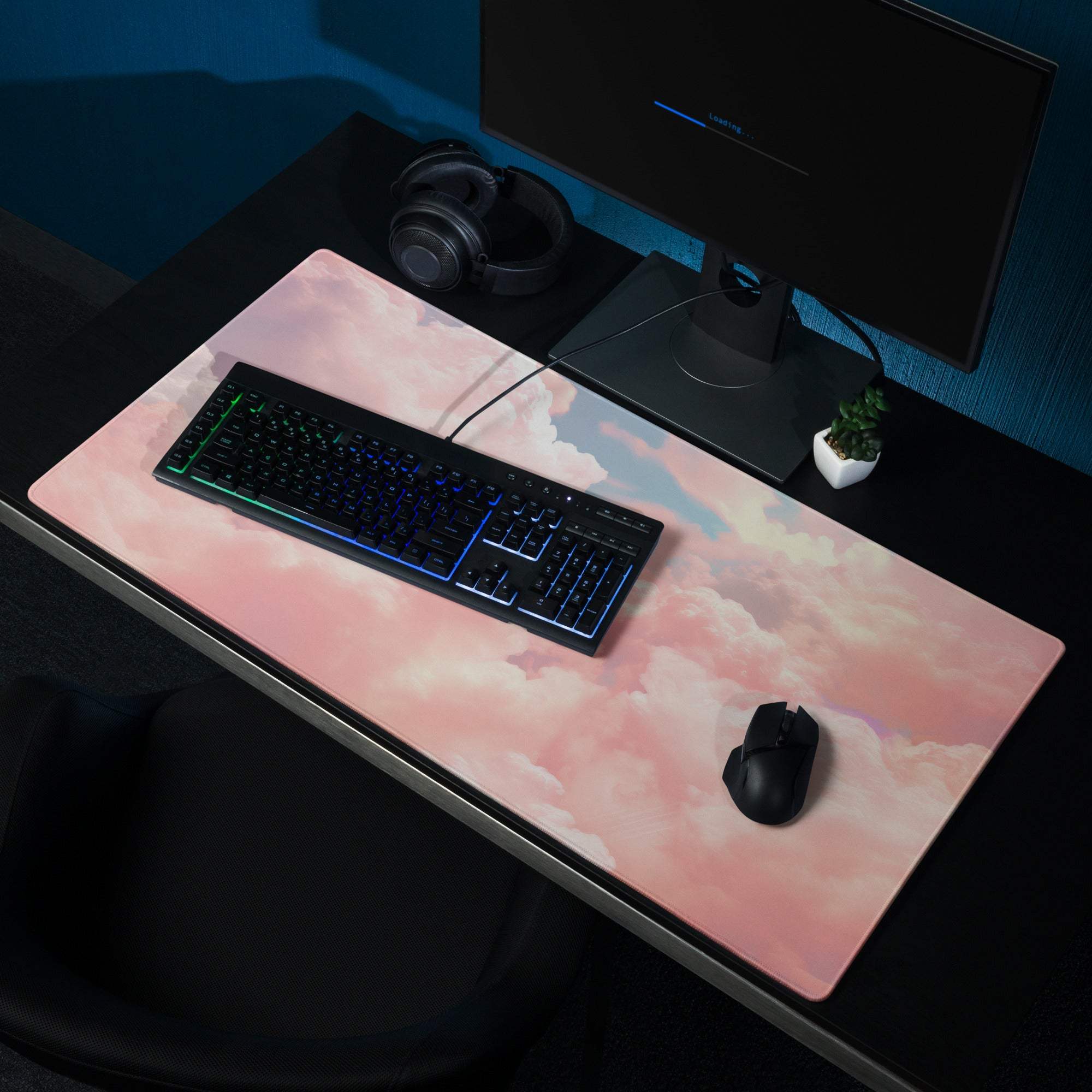 Dreamy pink cloud gaming mouse pad with stitched edges and non-slip base
