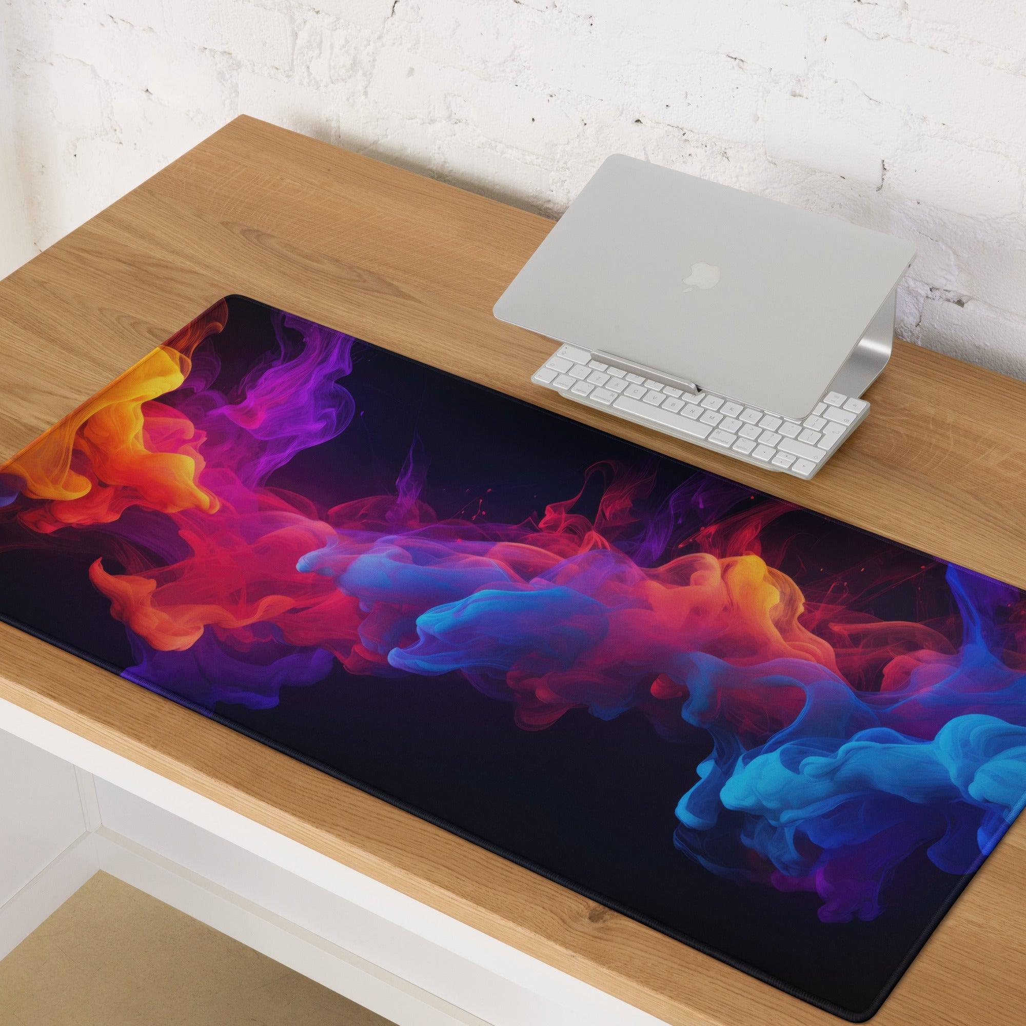 Vibrant multicolored ink swirls on black gaming mouse pad