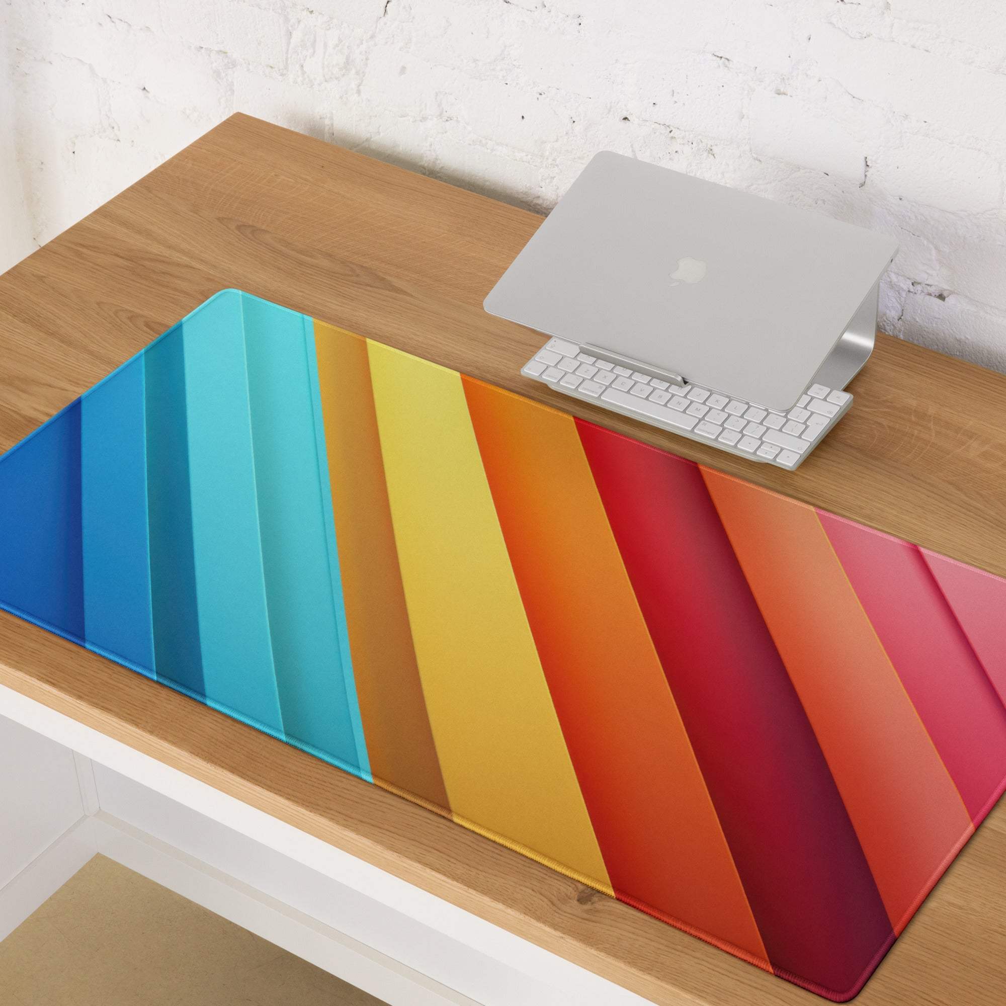 Vibrant rainbow gradient gaming mouse pad with large size, non-slip base and edge stitching