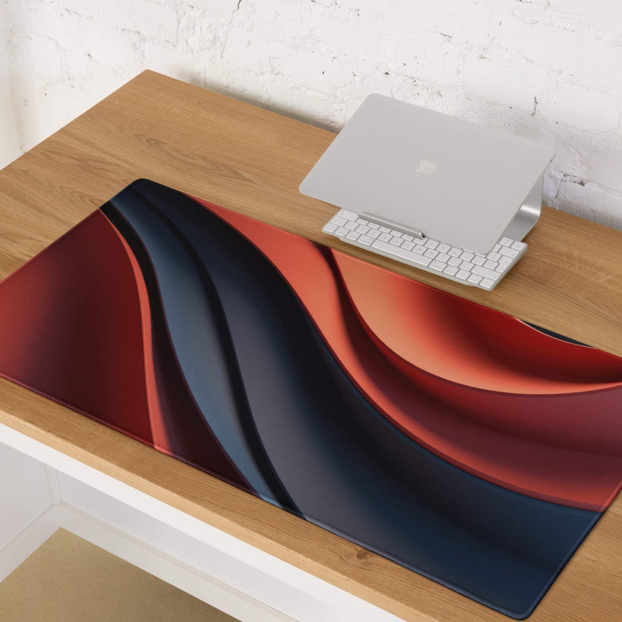Large bold red and blue wave gaming mouse pad with non-slip base