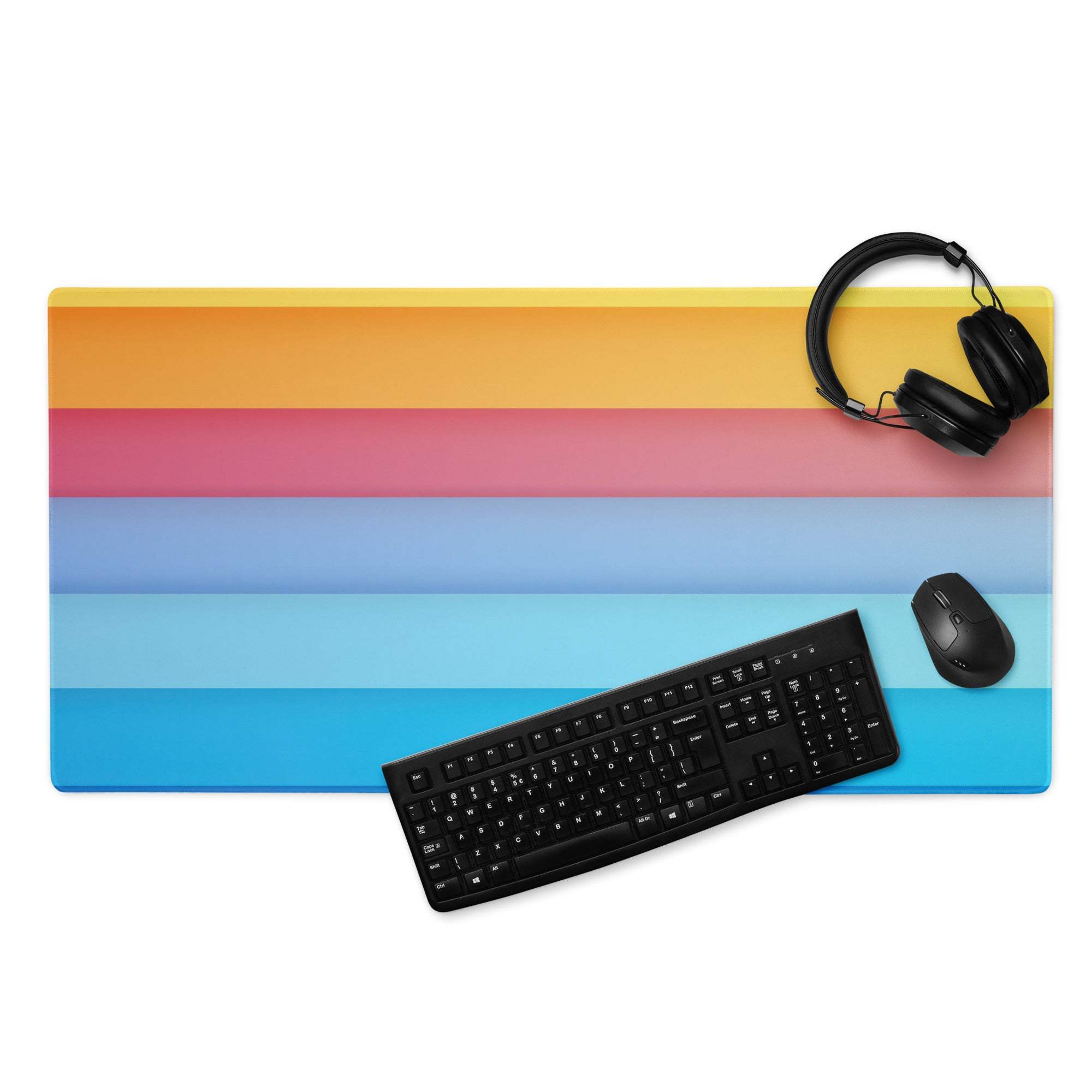 Large rainbow gradient gaming mouse pad with colorful stripes and non-slip base