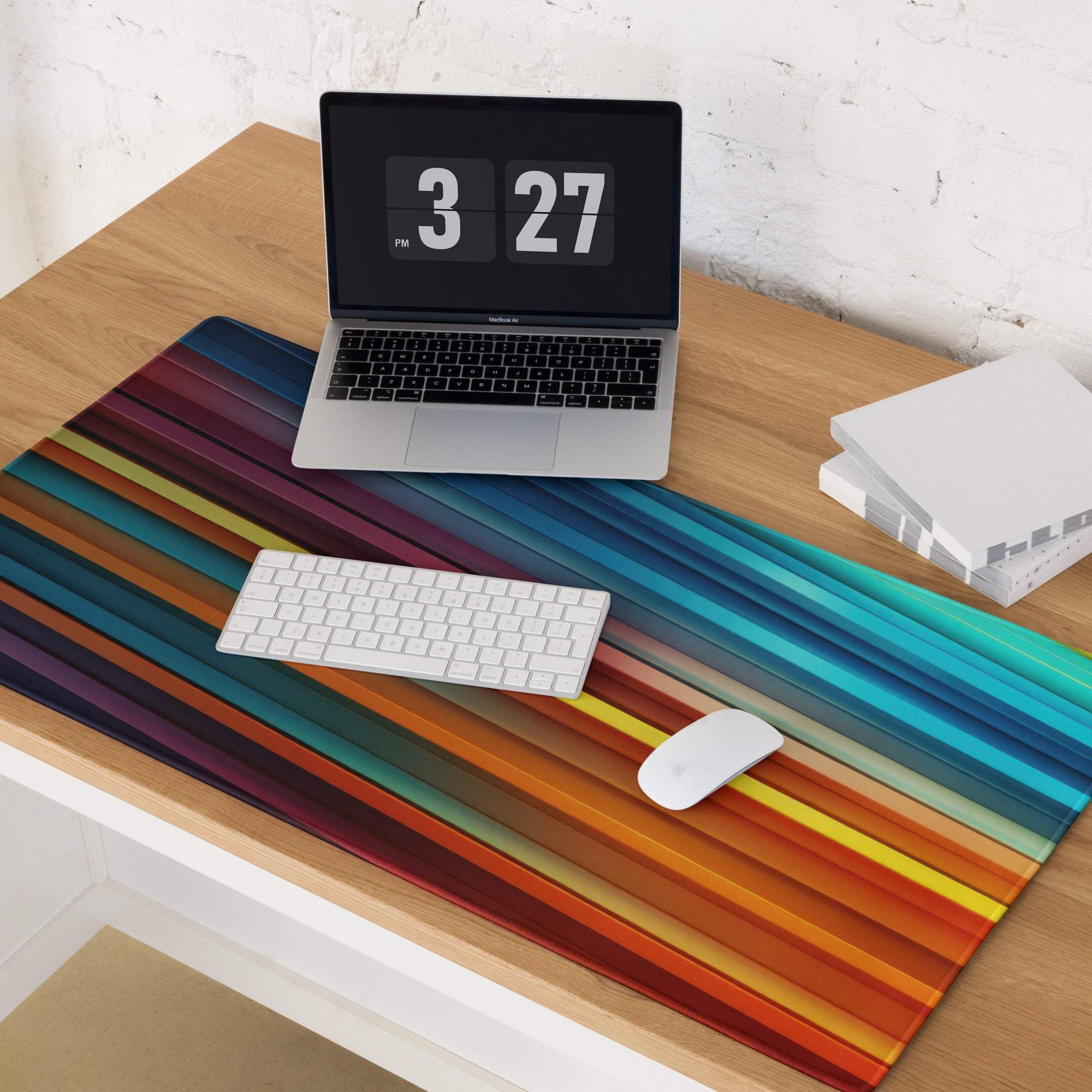 Vibrant rainbow-striped gaming mouse pad with non-slip base and stitched edges