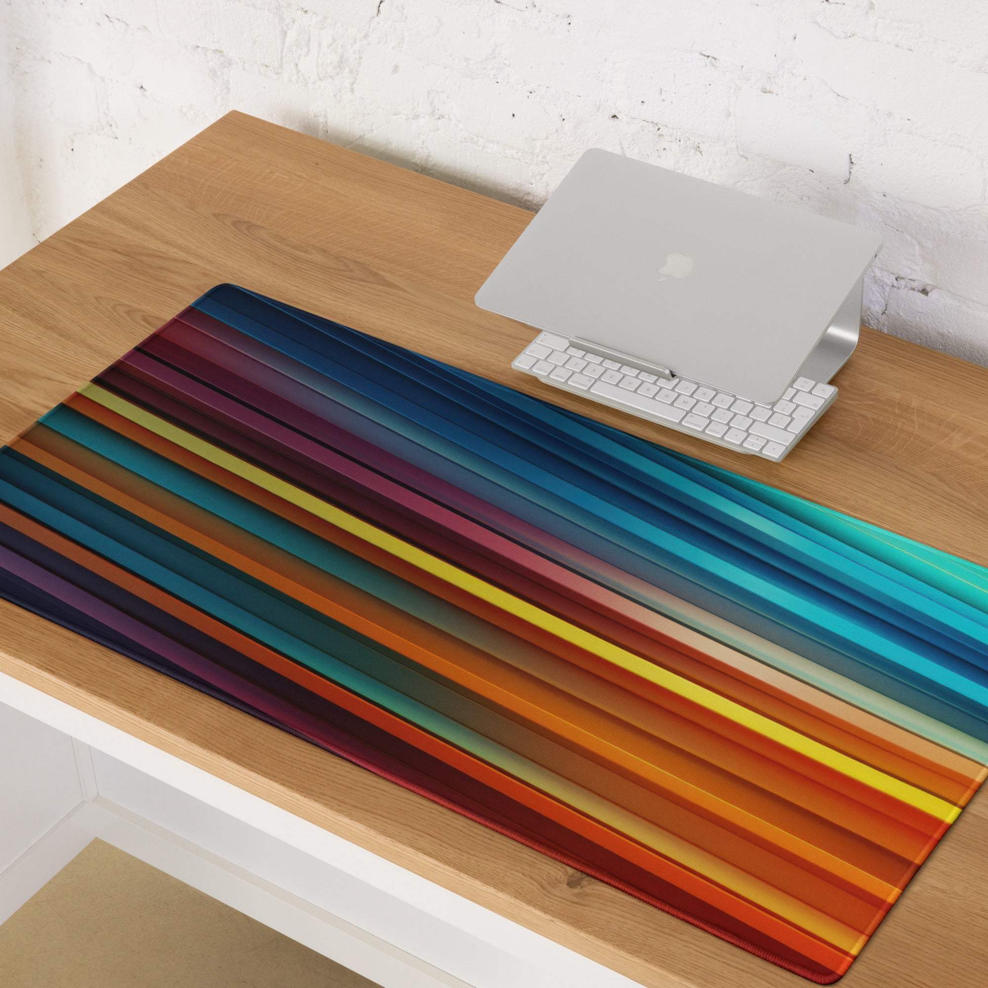 Vibrant rainbow-striped gaming mouse pad with non-slip base and stitched edges