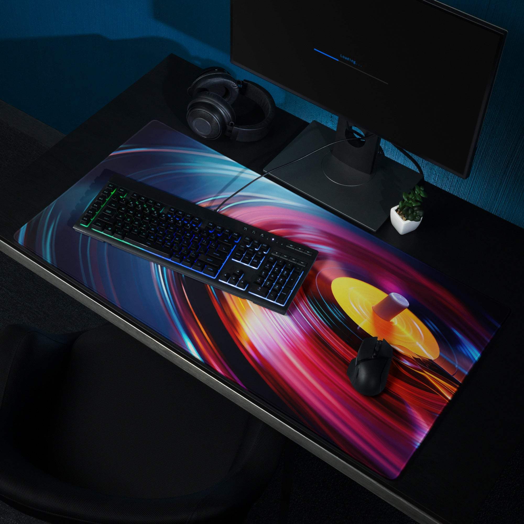 Vibrant vinyl turntable gaming mouse pad with neon pink blue swirls
