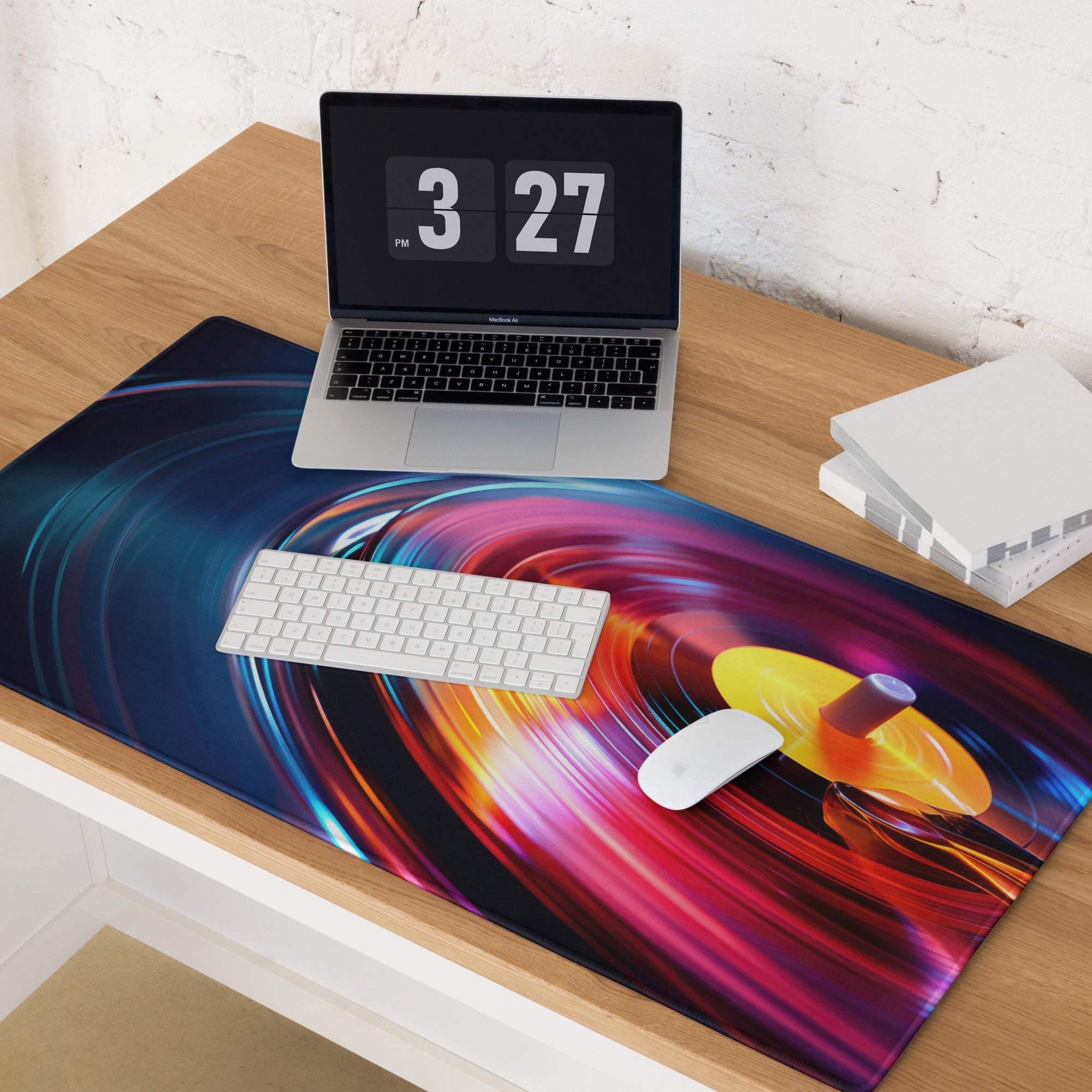 Vibrant vinyl turntable gaming mouse pad with rainbow swirls and non-slip base