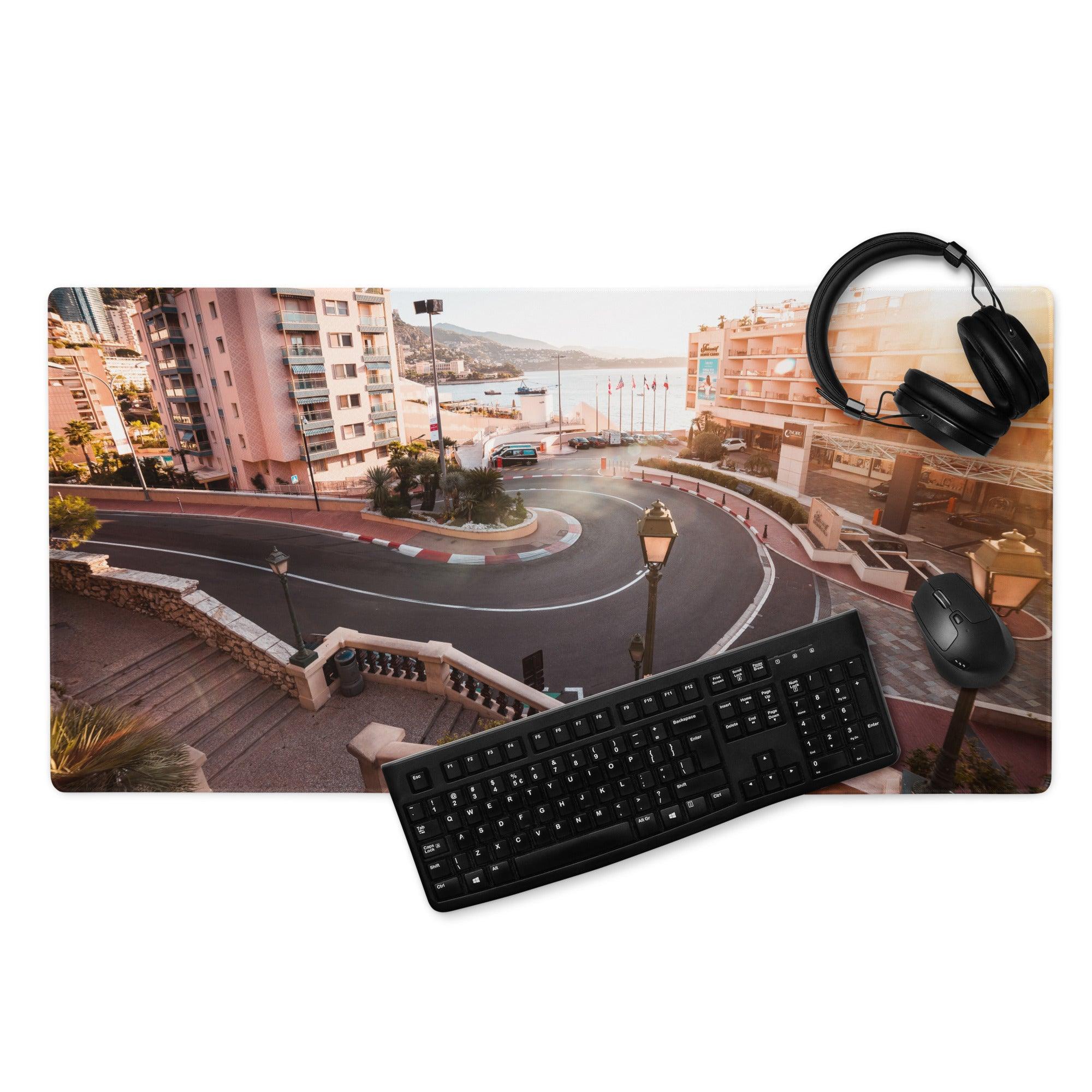 Black keyboard on urban sunset cityscape gaming mouse pad with coastal aerial view