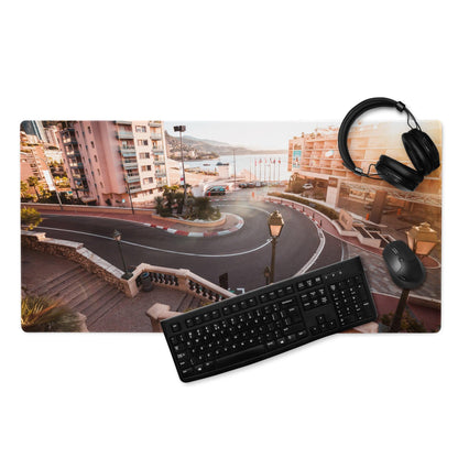 Black keyboard on urban sunset cityscape gaming mouse pad with coastal aerial view