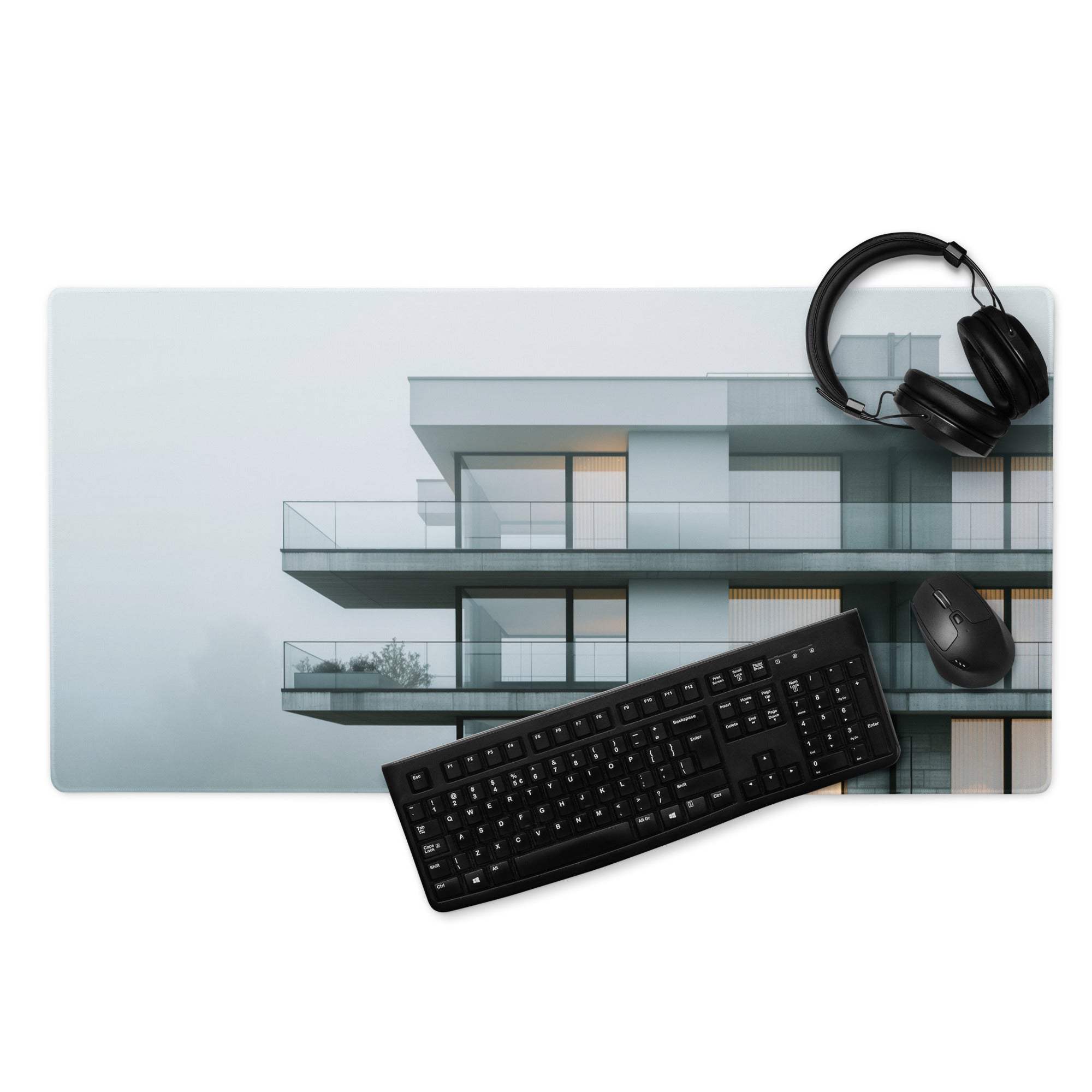 Minimalist architectural cityscape gaming mouse pad with keyboard and headphones
