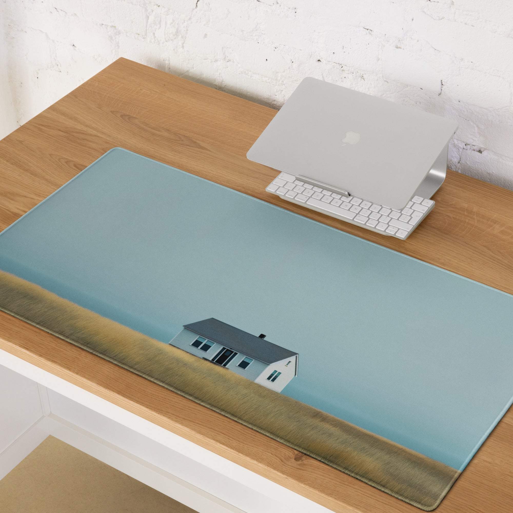 Calm coastal house scene on light blue large gaming mouse pad